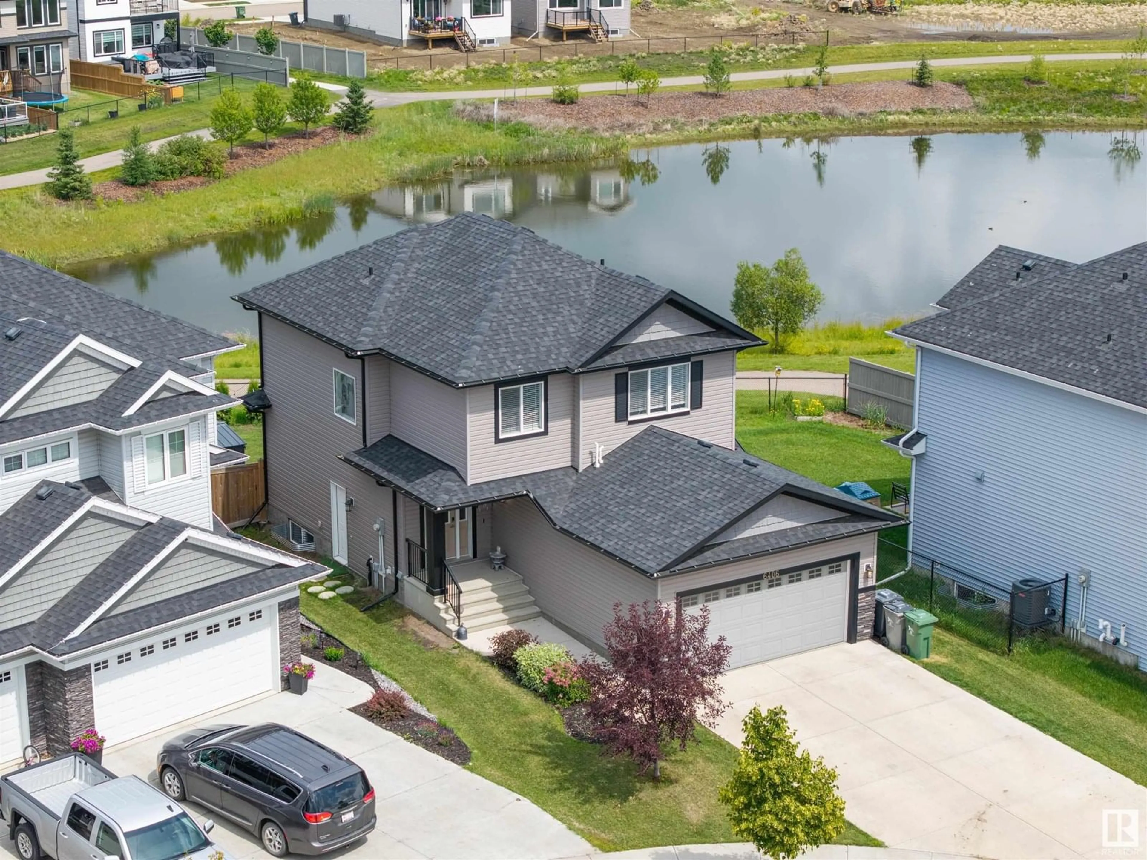 A pic from outside/outdoor area/front of a property/back of a property/a pic from drone, water/lake/river/ocean view for 6406 61 AV, Beaumont Alberta T4X1Z2