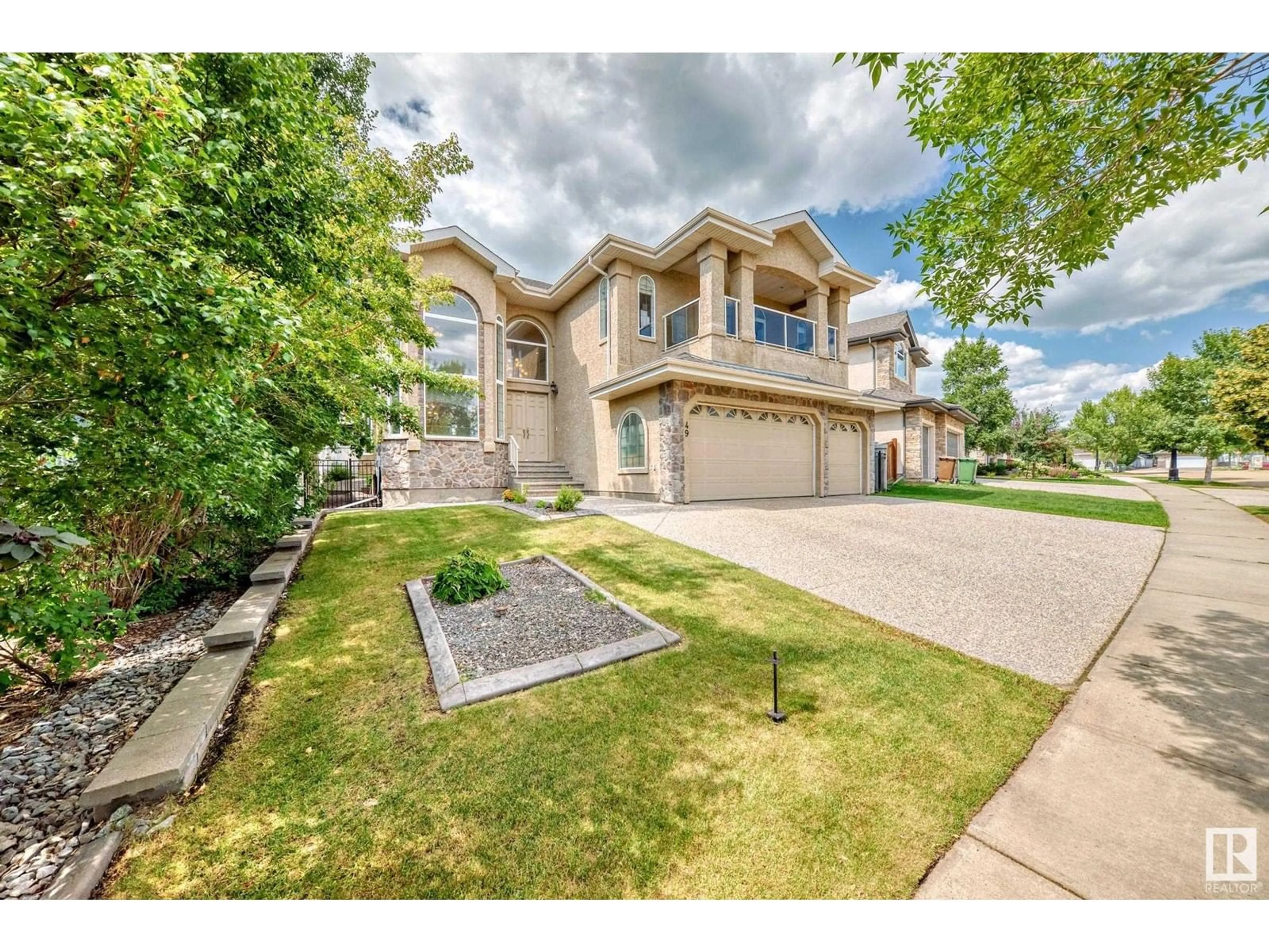 A pic from outside/outdoor area/front of a property/back of a property/a pic from drone, street for 49 LOISELLE WY, St. Albert Alberta T8N3C4