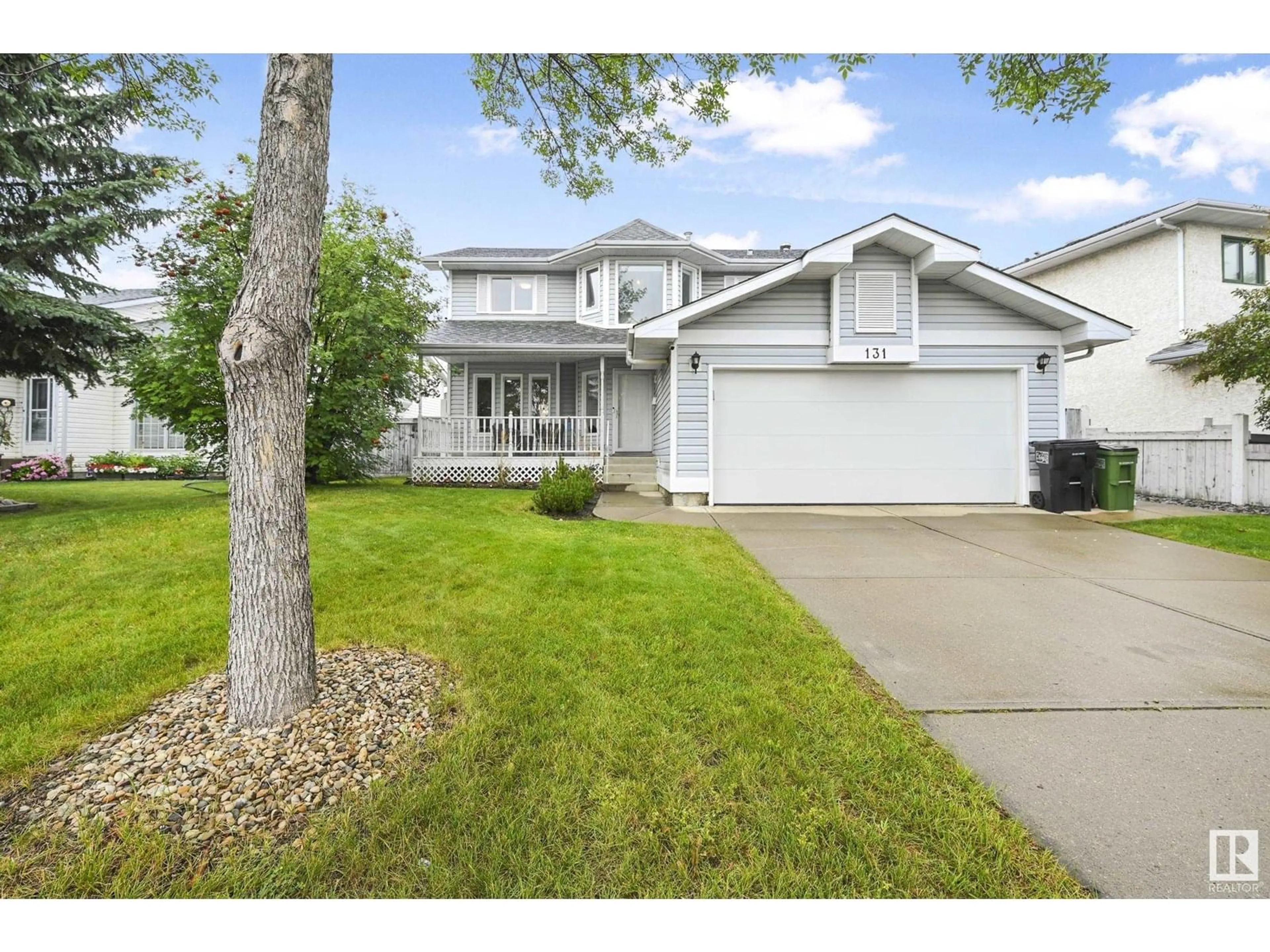 Home with vinyl exterior material, street for 131 ORMSBY RD, Edmonton Alberta T5T5T4
