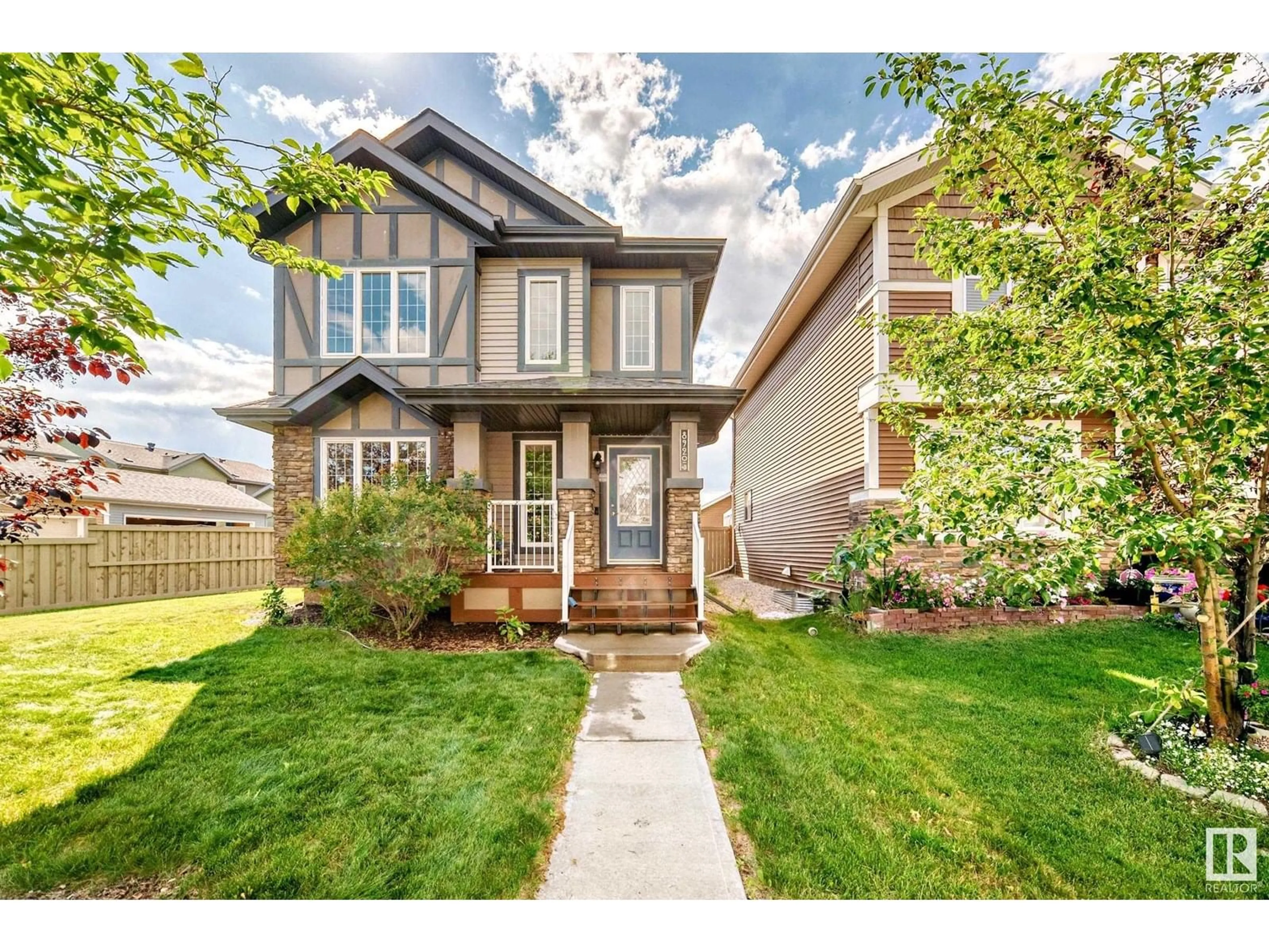 Home with vinyl exterior material, street for 8920 218 ST, Edmonton Alberta T5T4R8