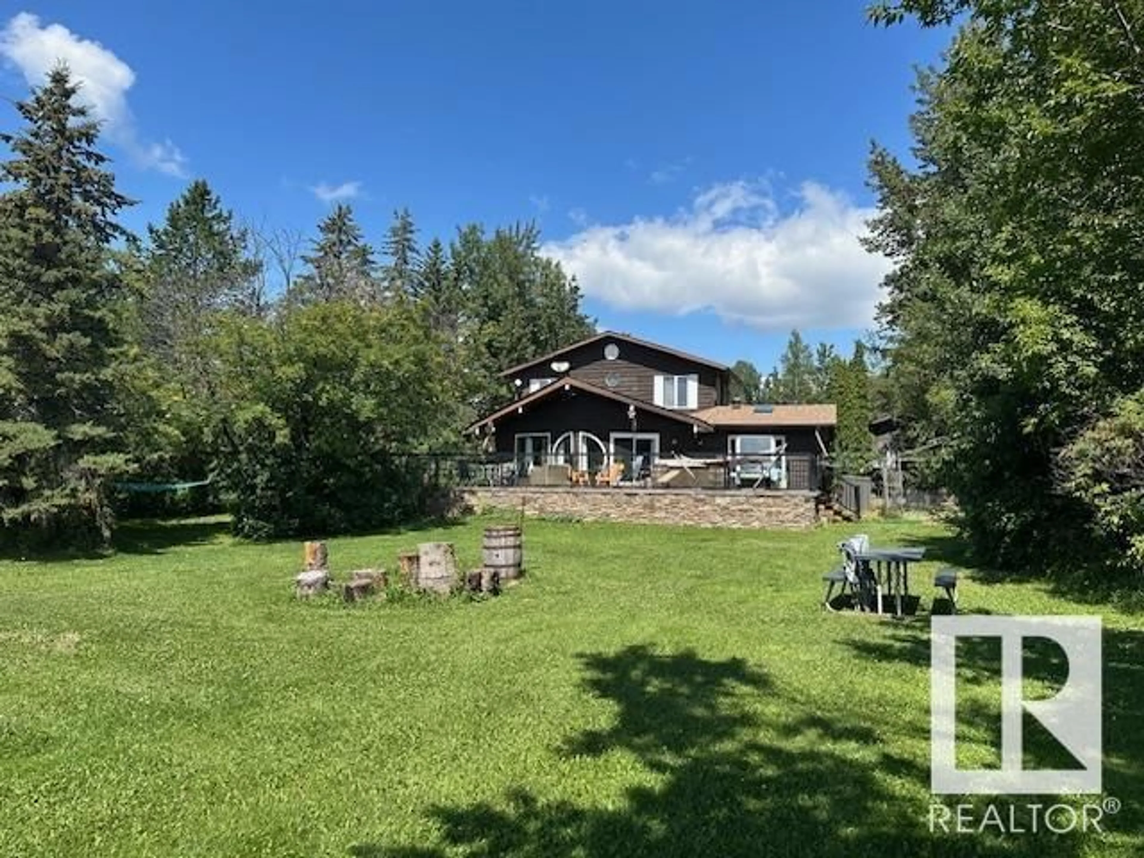 A pic from outside/outdoor area/front of a property/back of a property/a pic from drone, water/lake/river/ocean view for 609 55107 RGE ROAD 33, Rural Lac Ste. Anne County Alberta T0E1V0