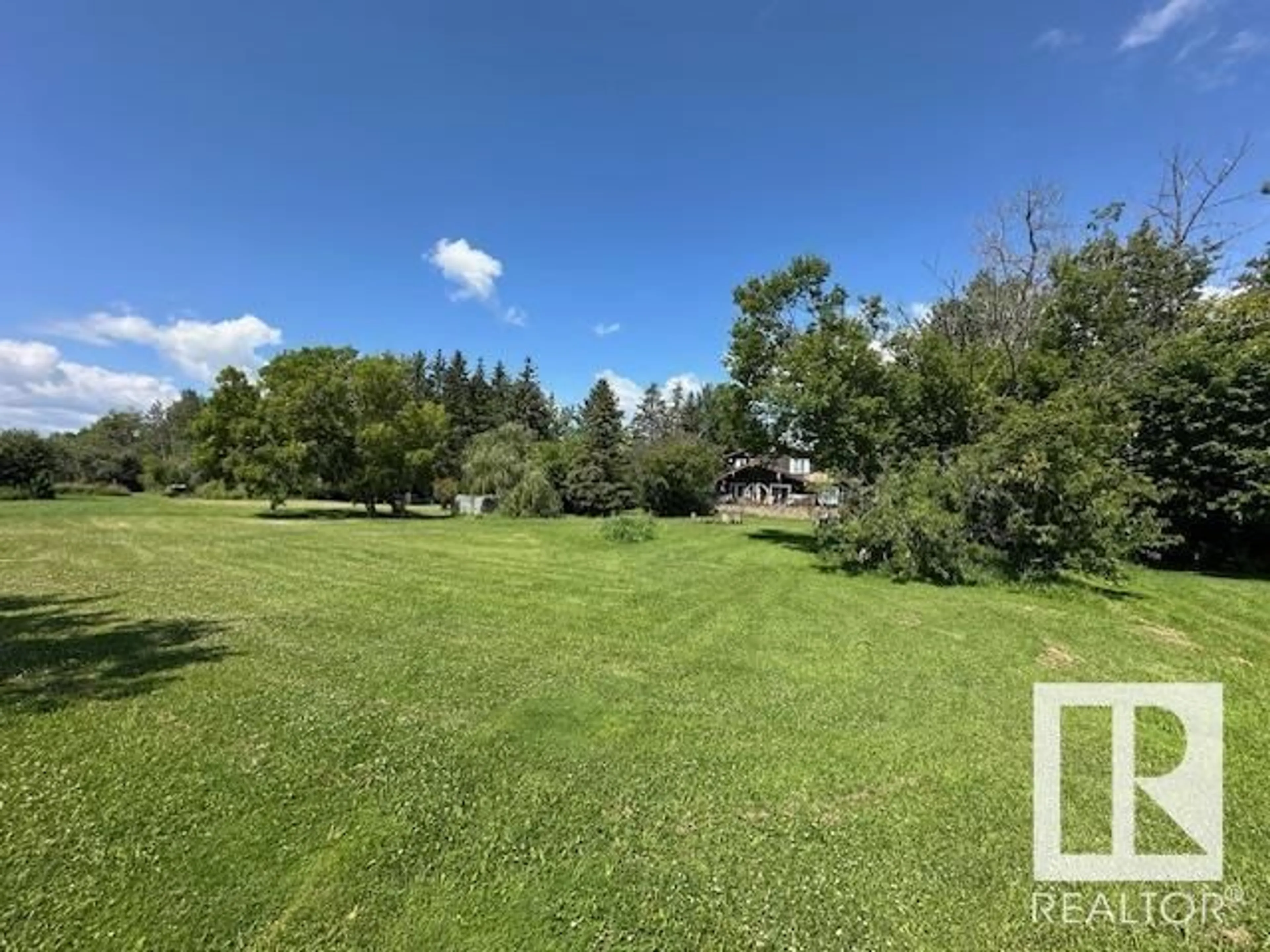 A pic from outside/outdoor area/front of a property/back of a property/a pic from drone, forest/trees view for 609 55107 RGE ROAD 33, Rural Lac Ste. Anne County Alberta T0E1V0
