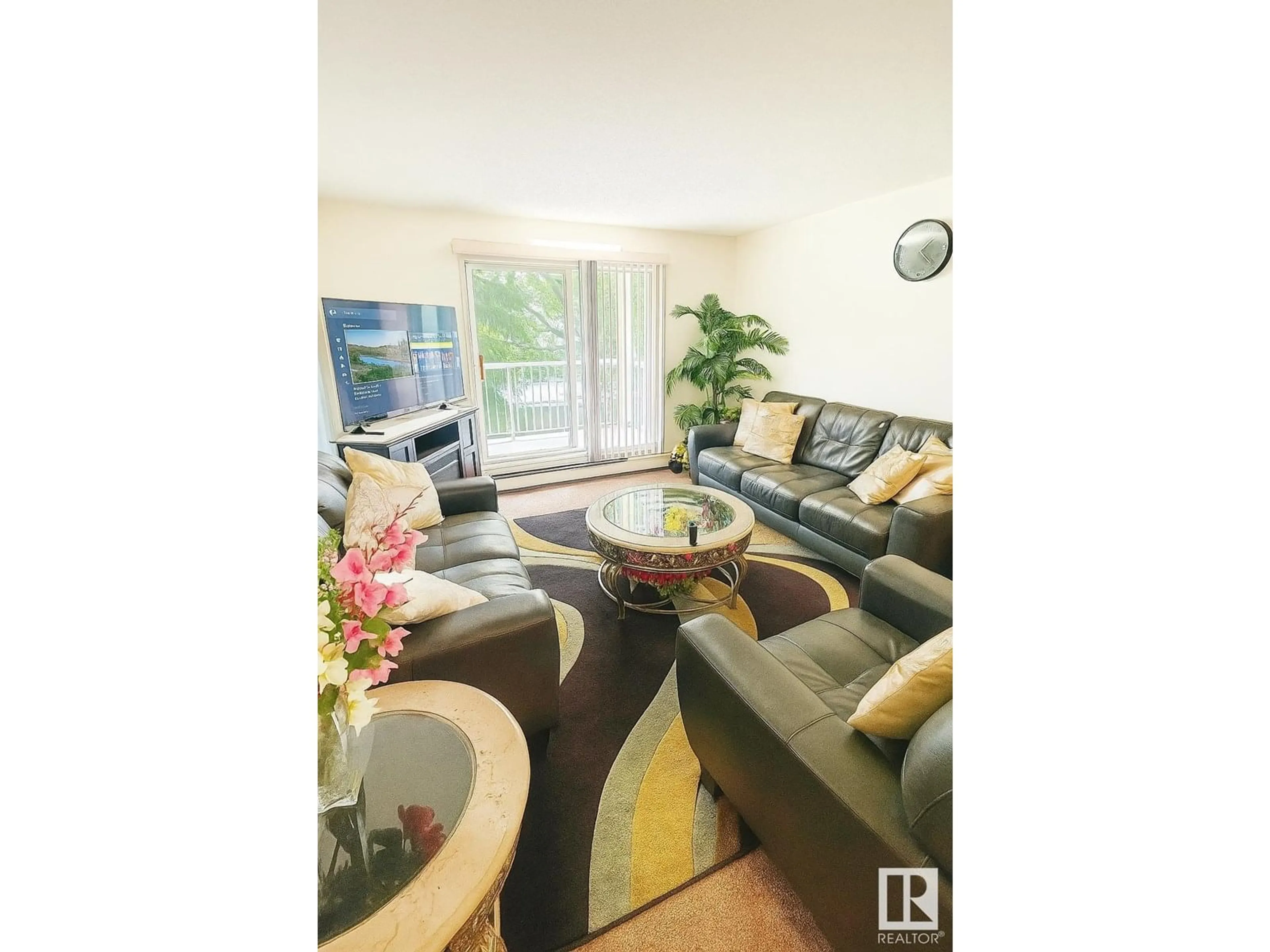 Living room with furniture, wood/laminate floor for #204 - 4220 139 AV, Edmonton Alberta T5Y2Y2