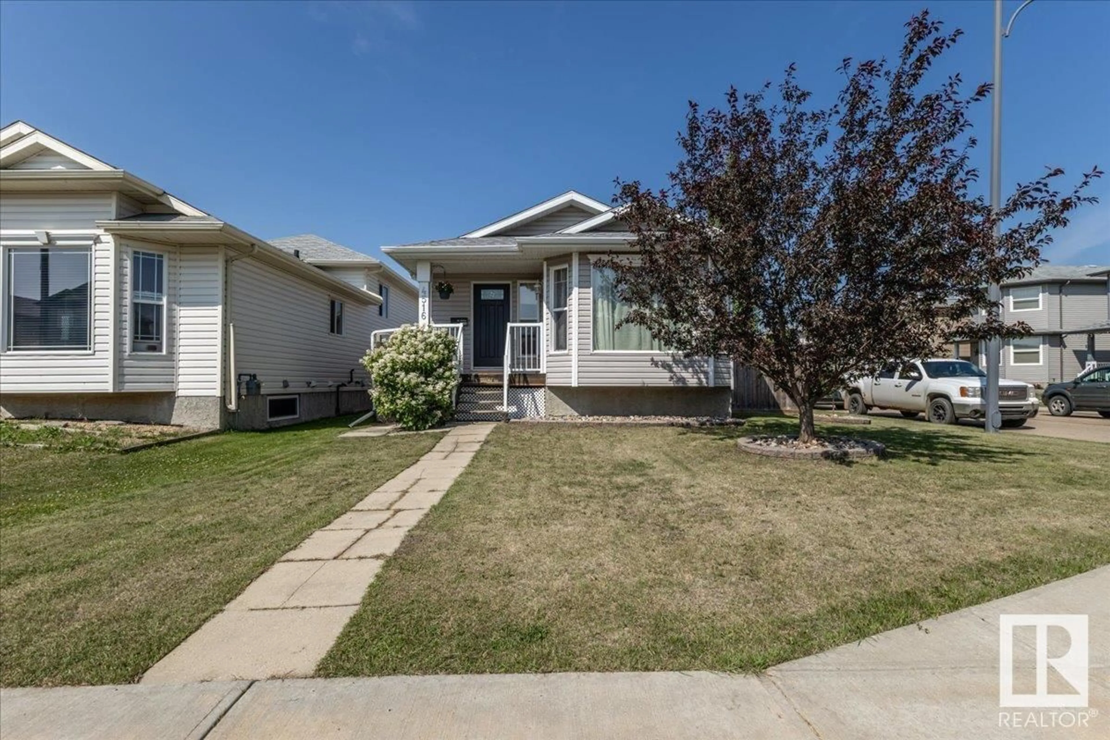 Home with vinyl exterior material, street for 4516 73A ST, Camrose Alberta T4V1X9