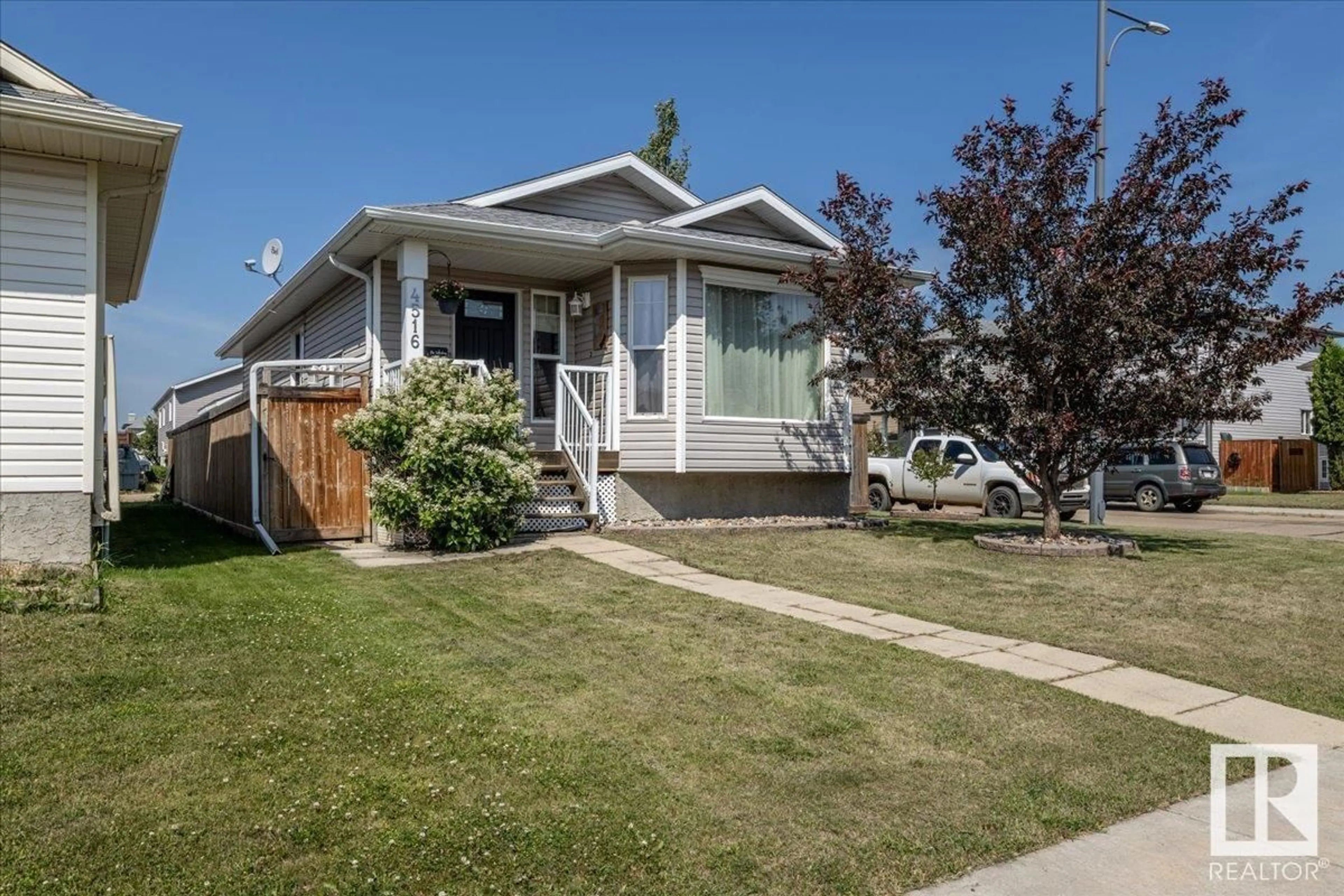 Home with vinyl exterior material, street for 4516 73A ST, Camrose Alberta T4V1X9