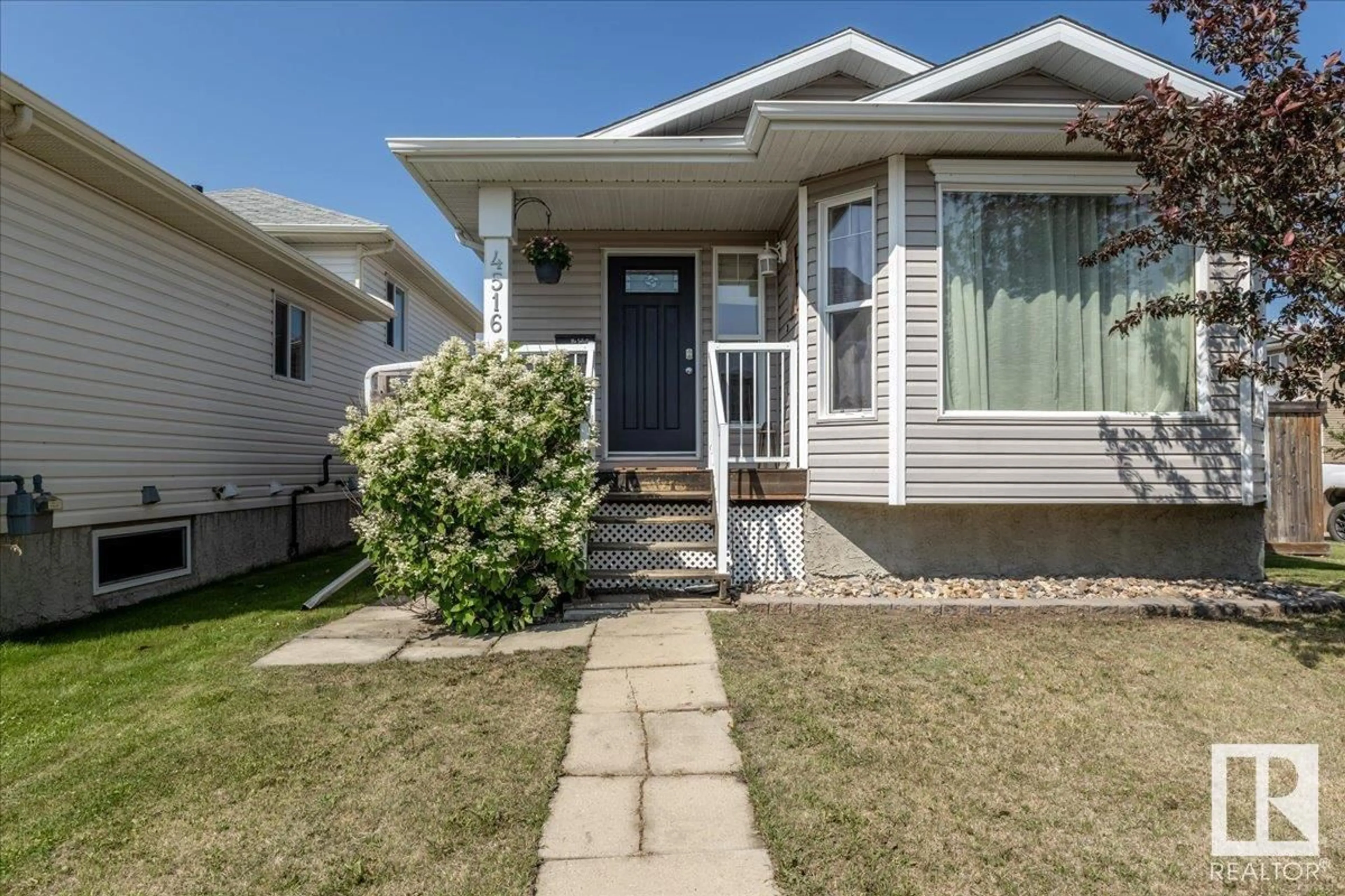 Home with vinyl exterior material, street for 4516 73A ST, Camrose Alberta T4V1X9