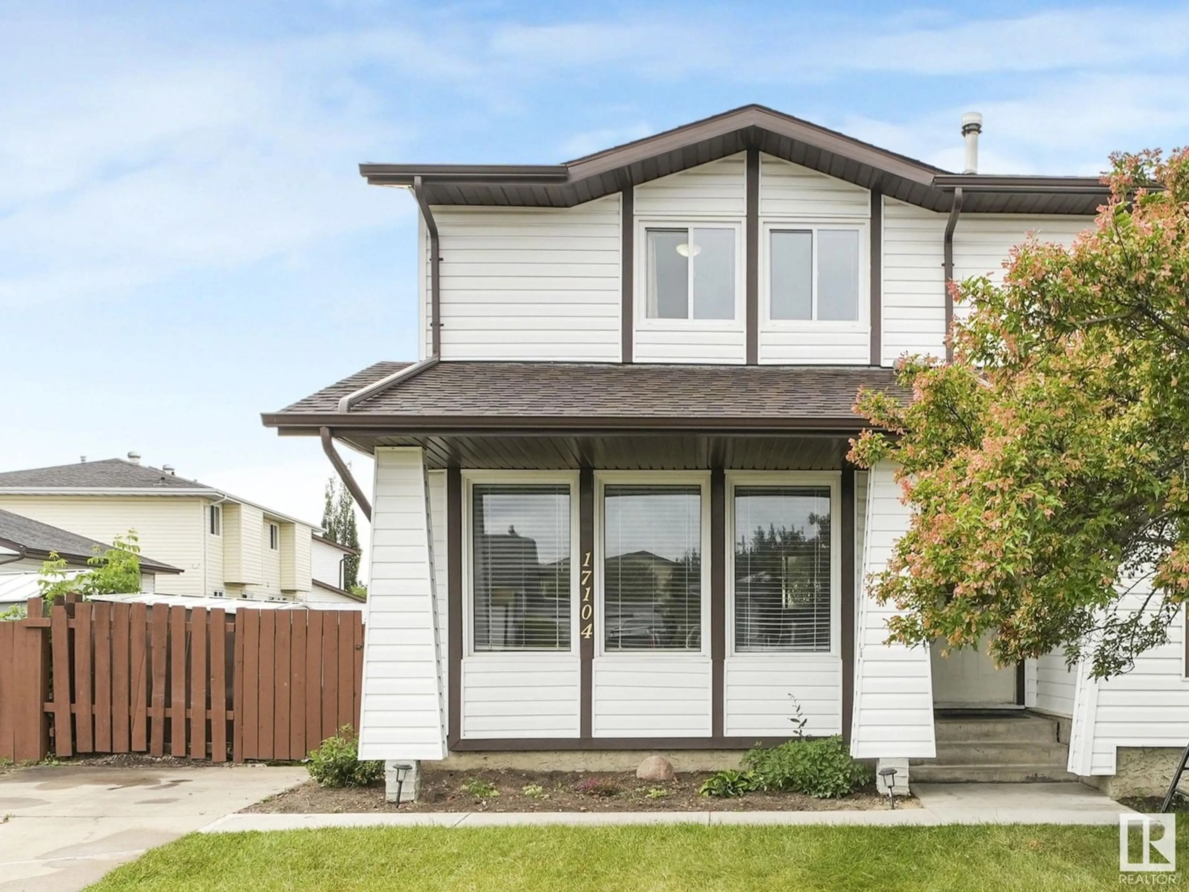 Home with vinyl exterior material, street for 17104 103 ST, Edmonton Alberta T5X4Z4