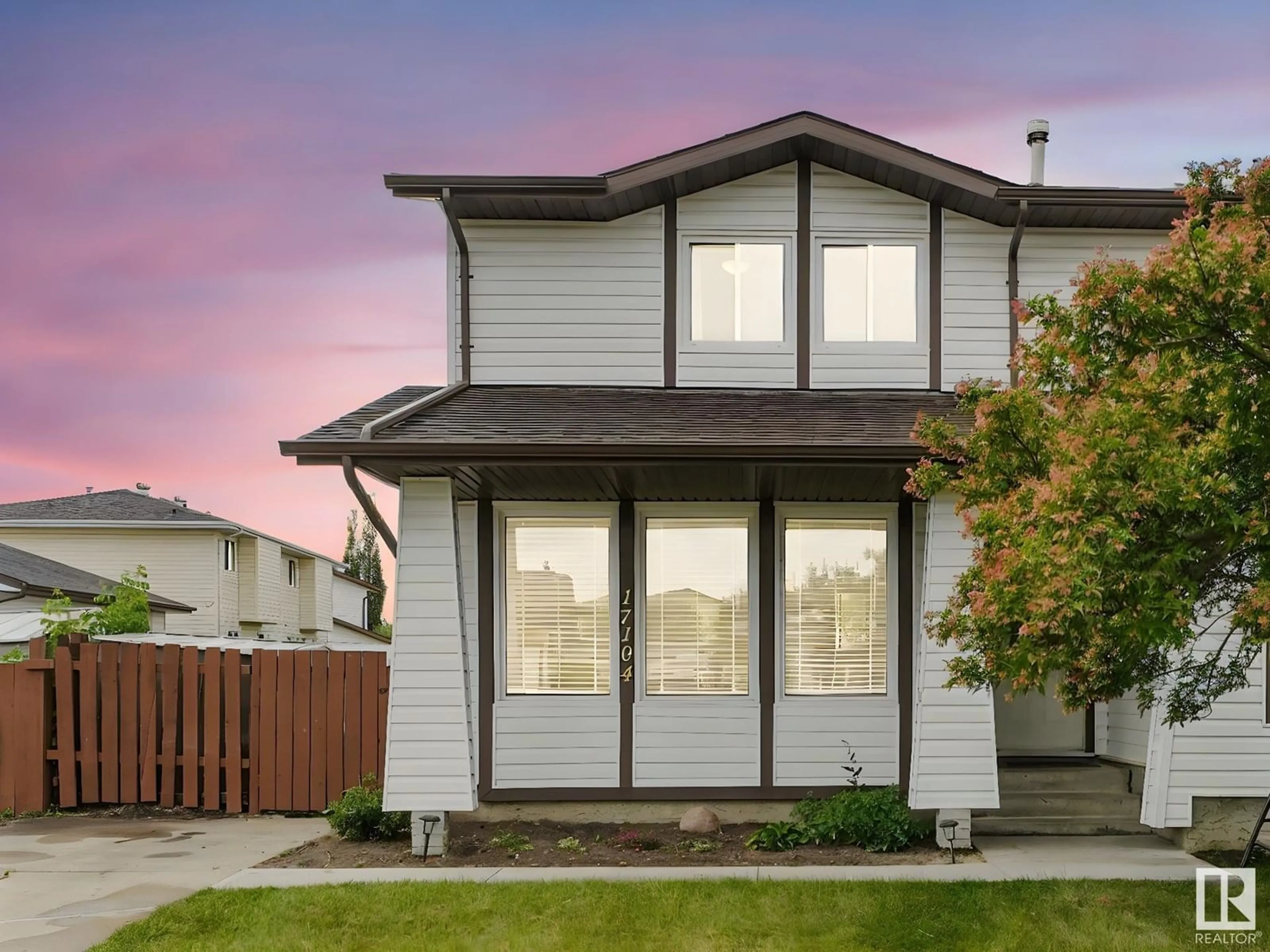 Home with vinyl exterior material, street for 17104 103 ST, Edmonton Alberta T5X4Z4