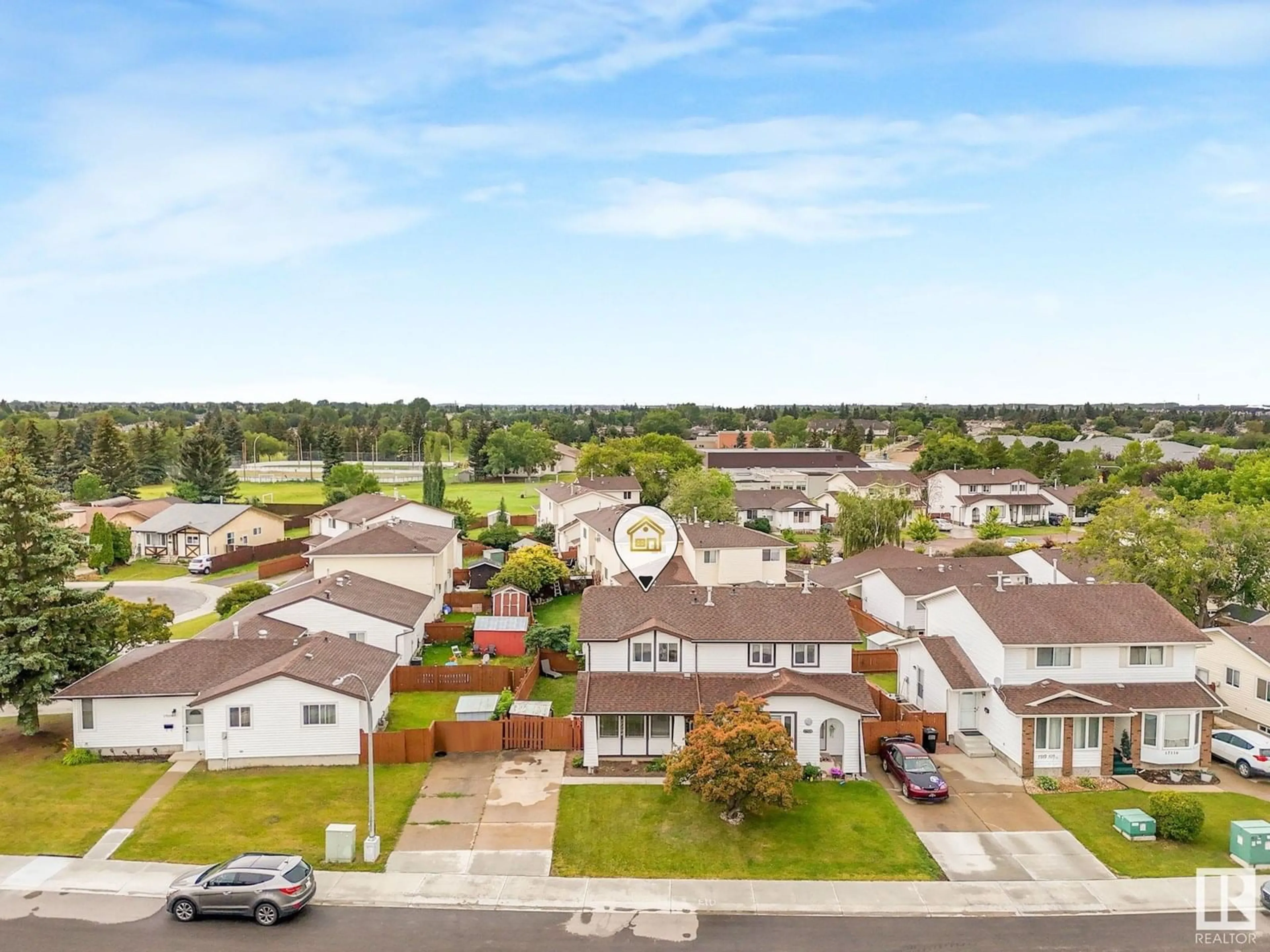 A pic from outside/outdoor area/front of a property/back of a property/a pic from drone, street for 17104 103 ST, Edmonton Alberta T5X4Z4