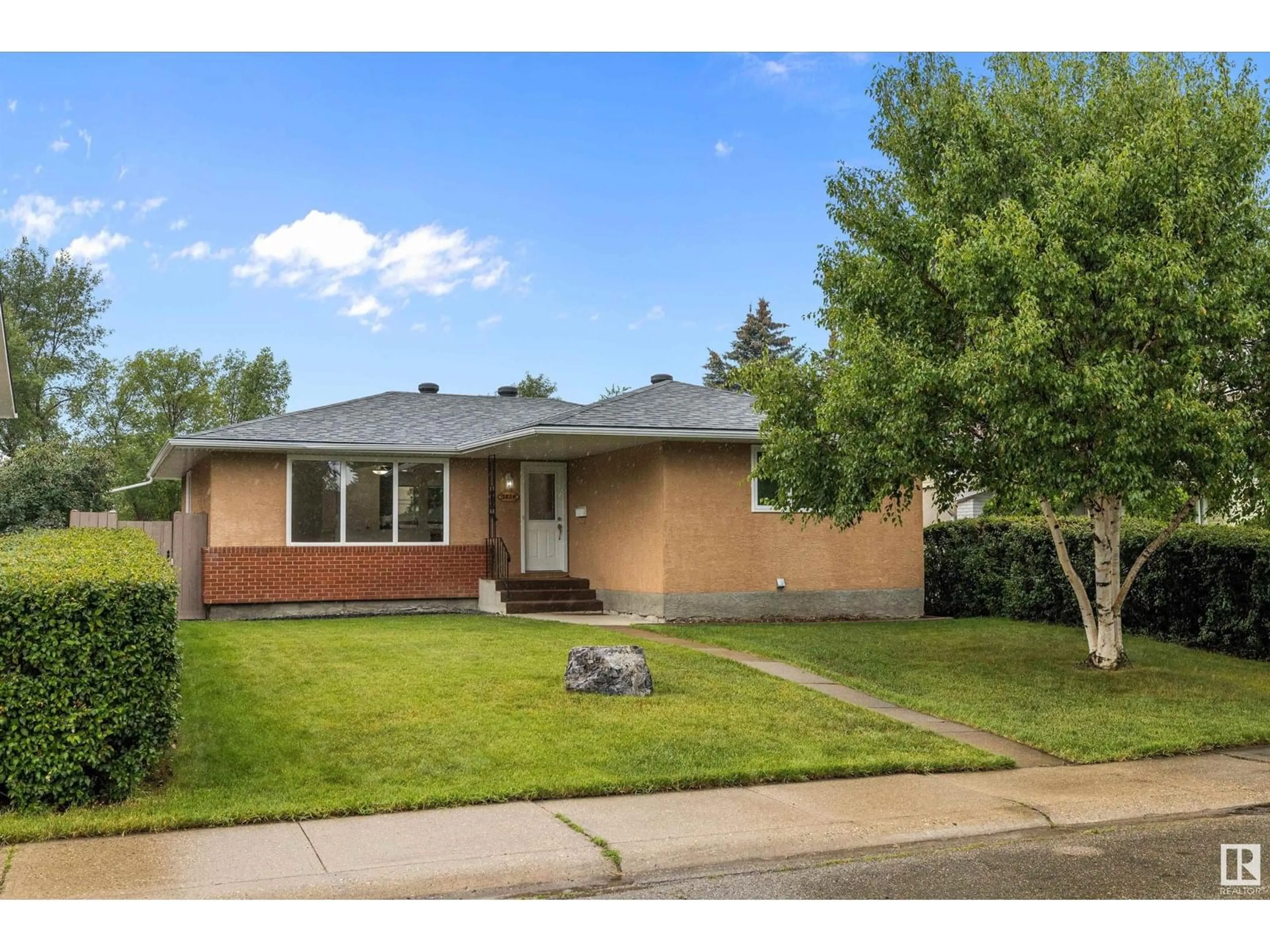 Home with brick exterior material, street for 3824 110 ST, Edmonton Alberta T6J1E4