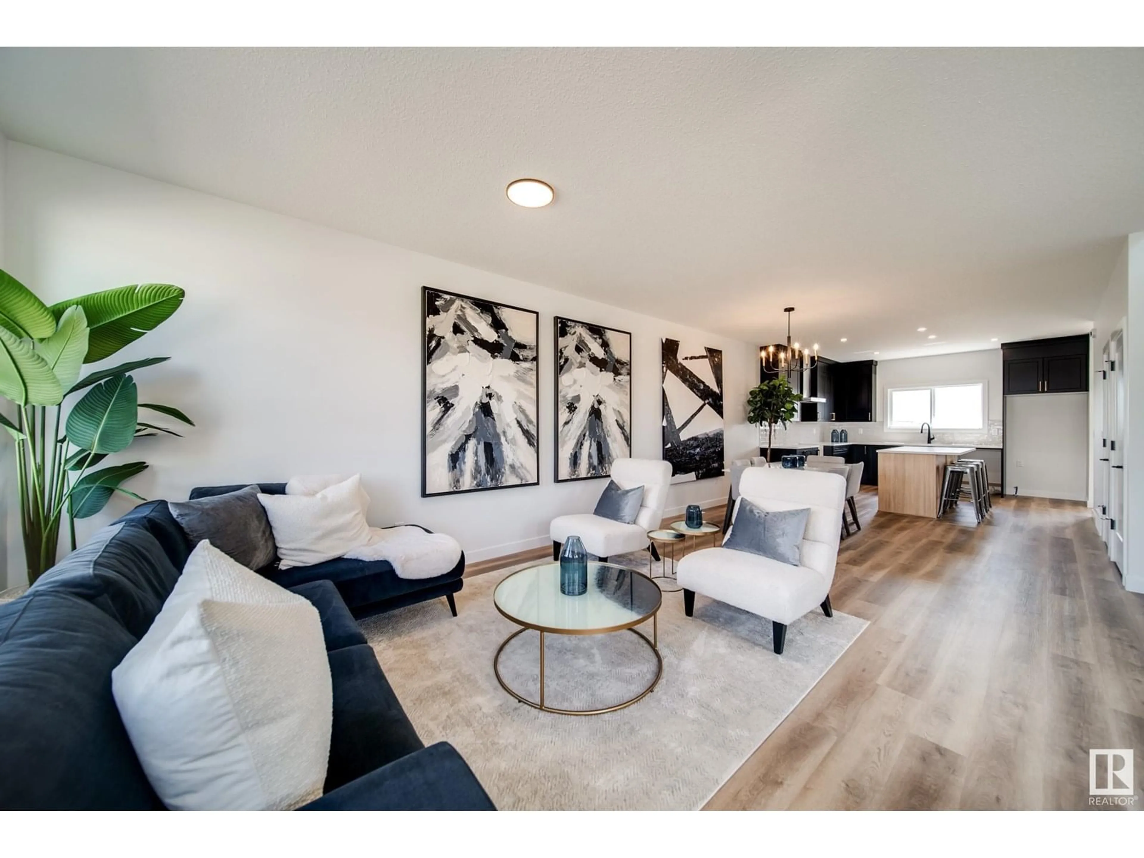 Living room with furniture, wood/laminate floor for 57 SIENNA BV, Fort Saskatchewan Alberta T8L0W3