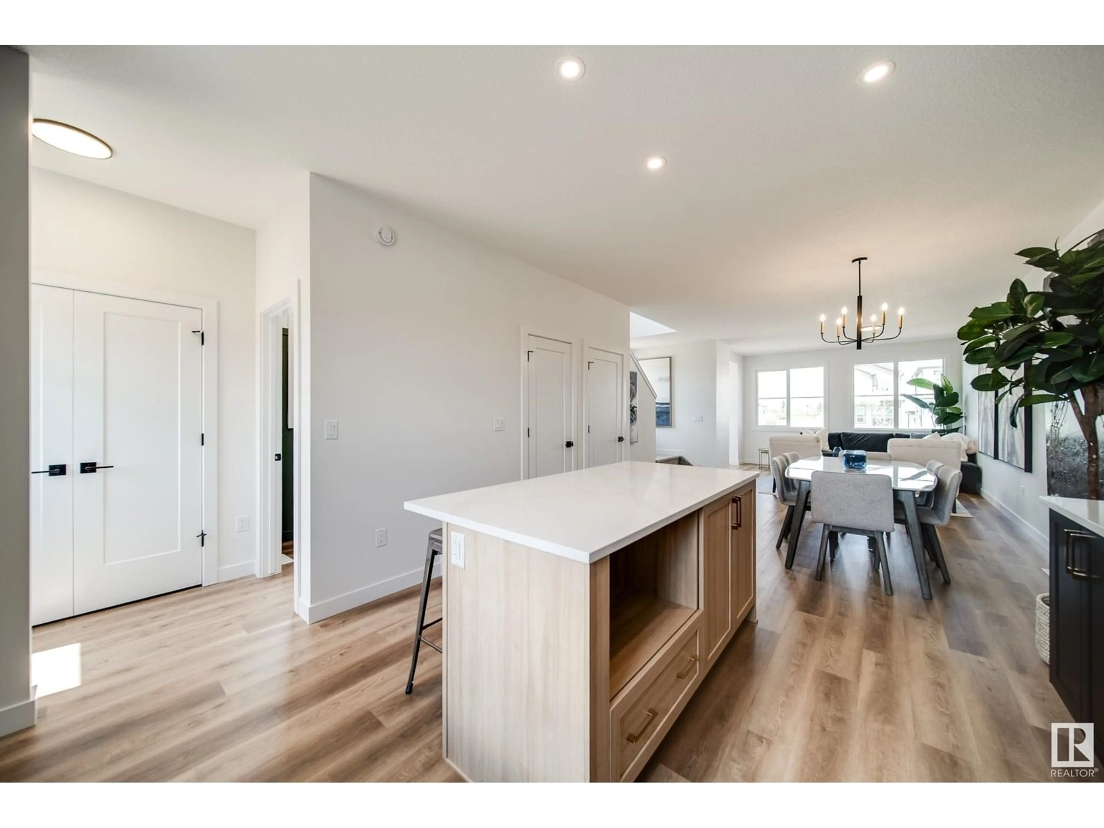 Open concept kitchen, wood/laminate floor for 57 SIENNA BV, Fort Saskatchewan Alberta T8L0W3