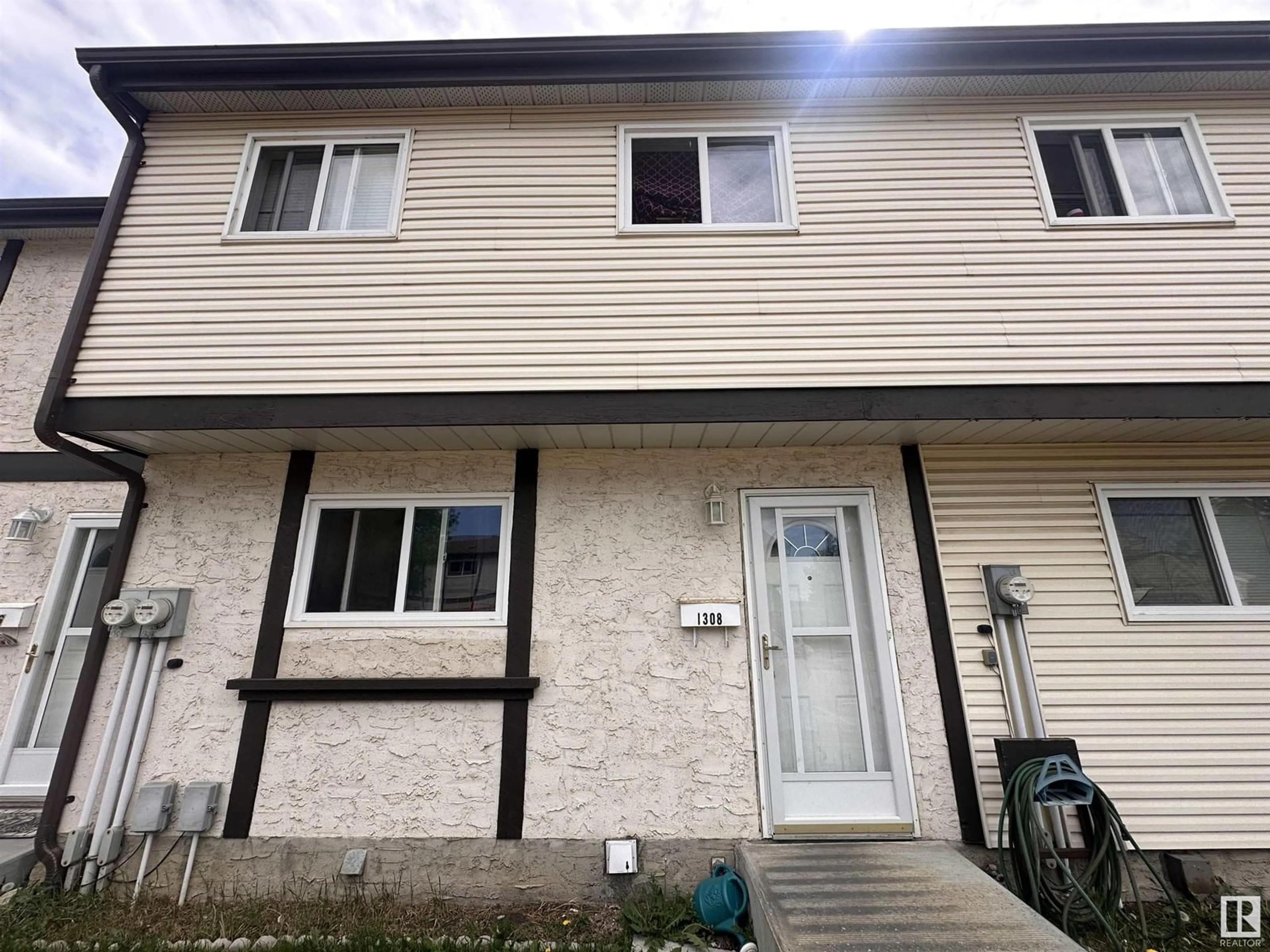 Home with vinyl exterior material, street for NW - 1308 LAKEWOOD W, Edmonton Alberta T6K3P2
