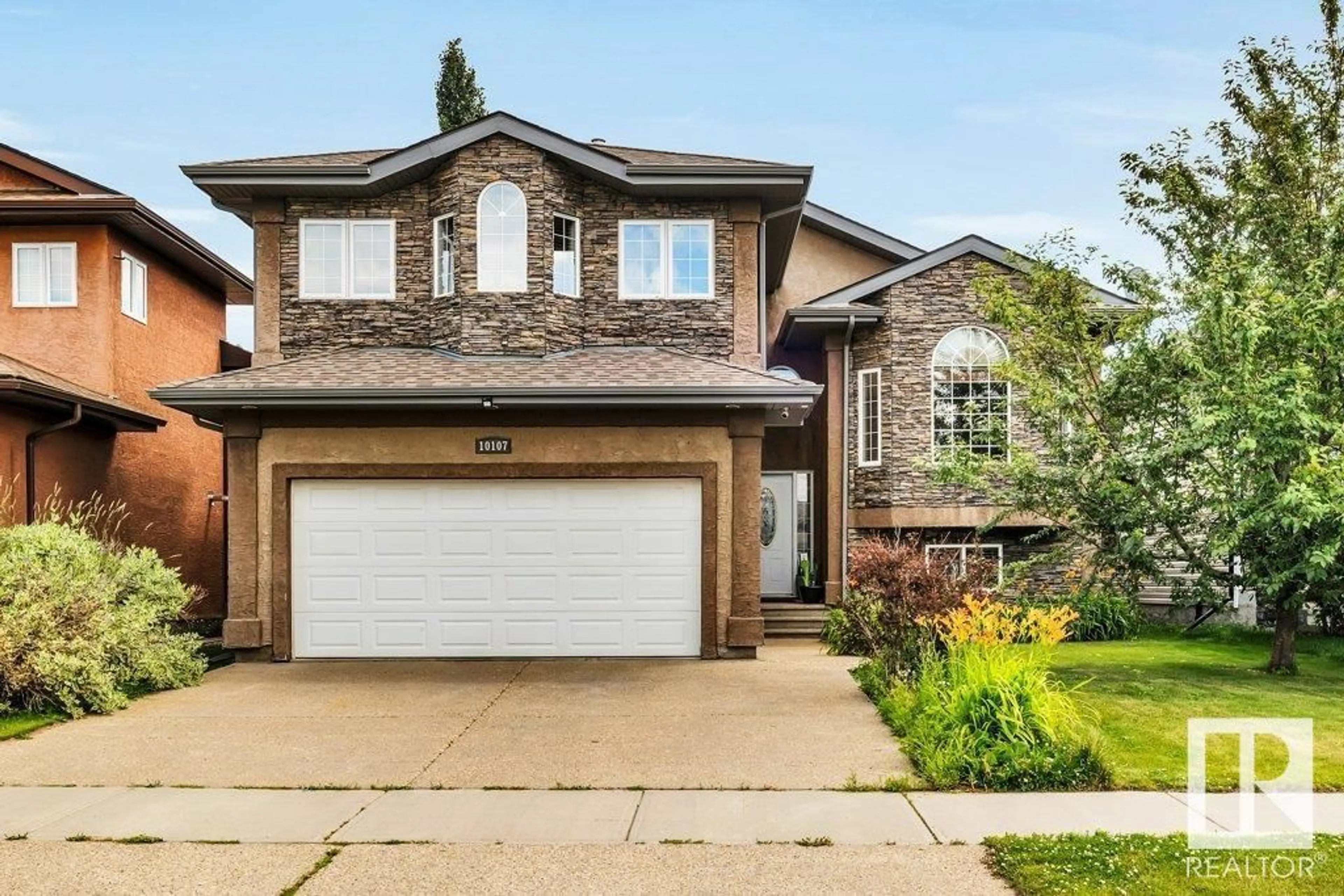 Home with brick exterior material, street for 10107 97 ST, Morinville Alberta T8R0C8