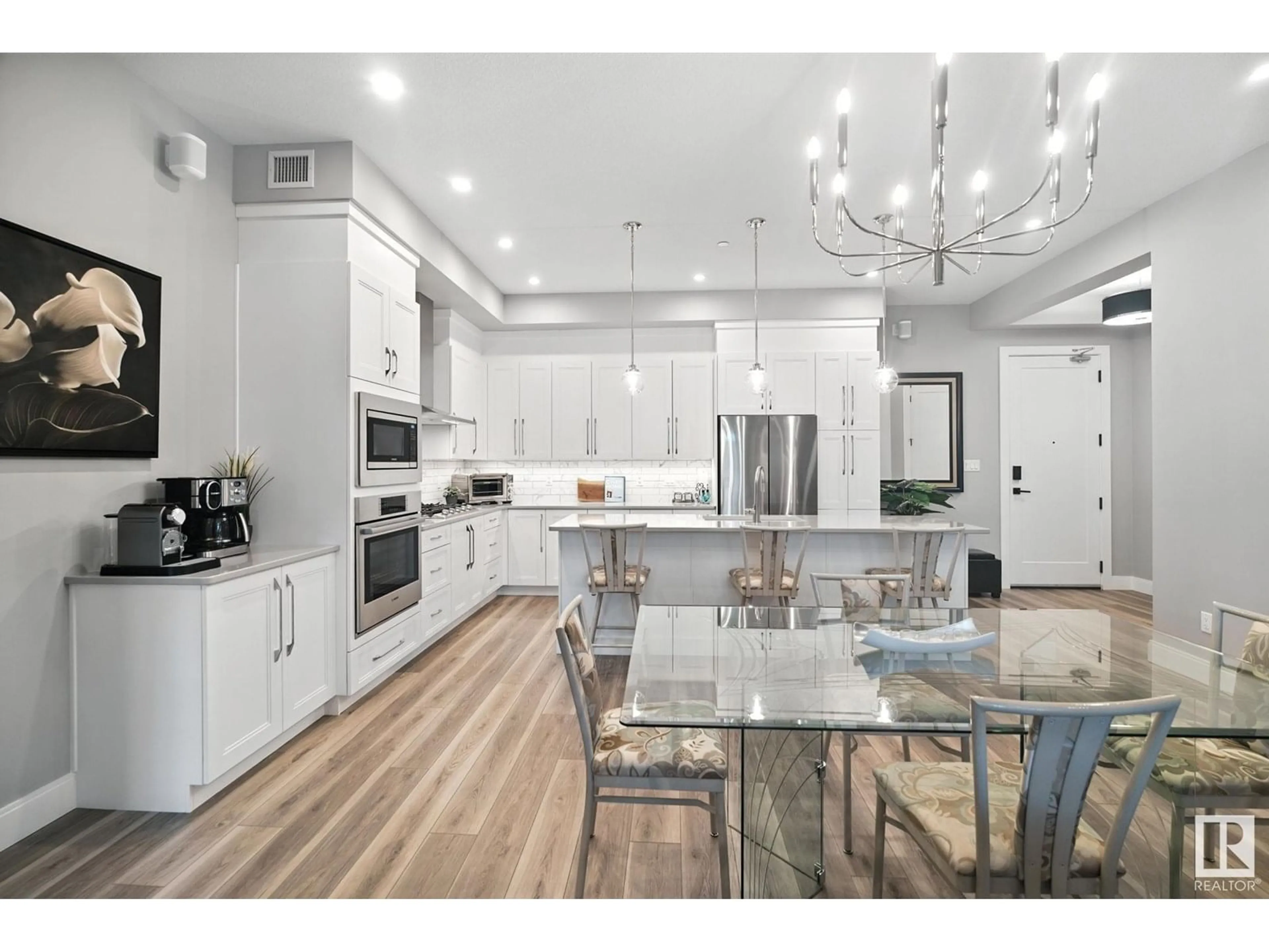 Open concept kitchen, unknown for #112 - 7463 MAY CM, Edmonton Alberta T6R0X1