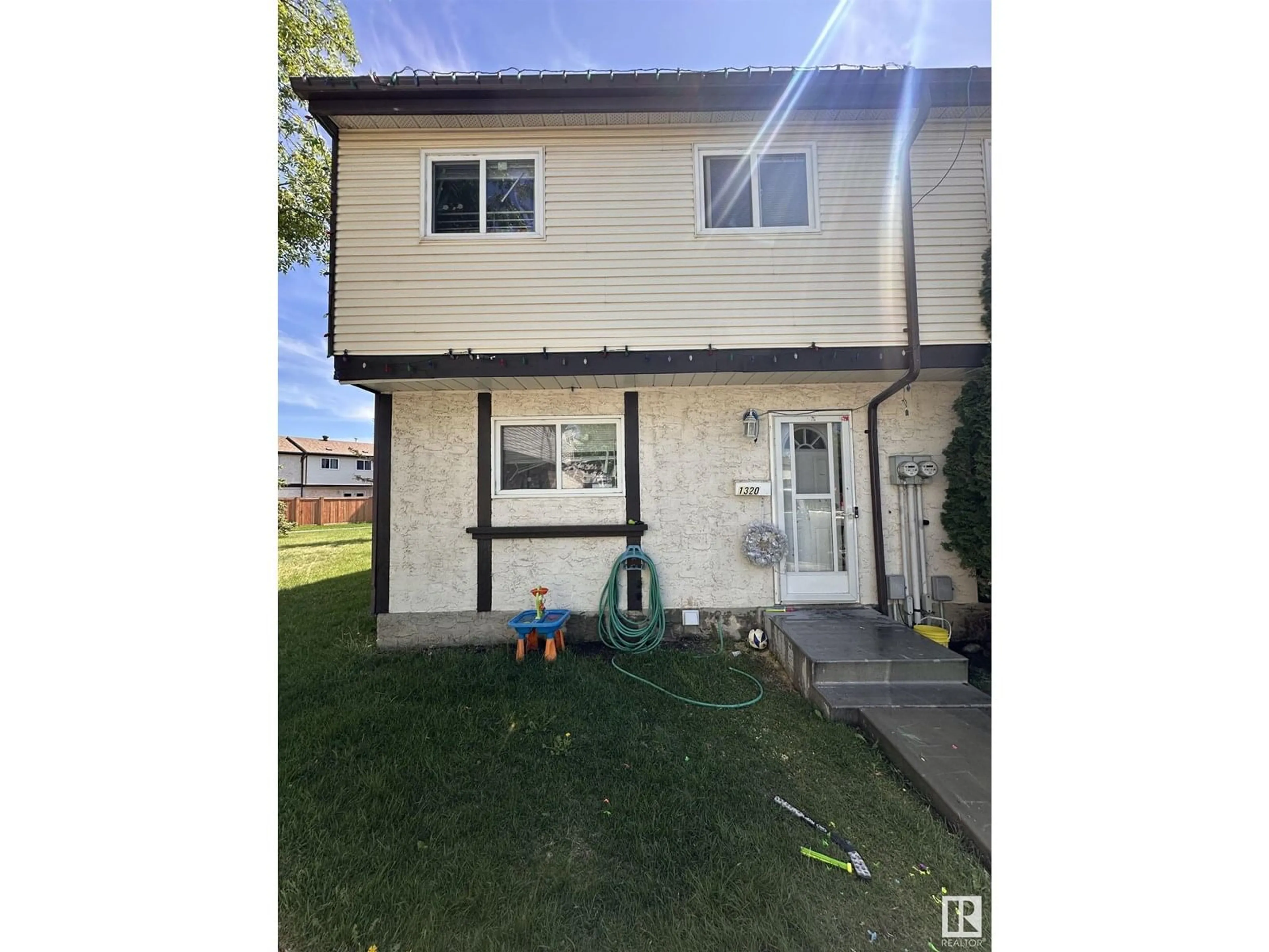Home with vinyl exterior material, street for NW - 1320 LAKEWOOD W, Edmonton Alberta T6K3P2