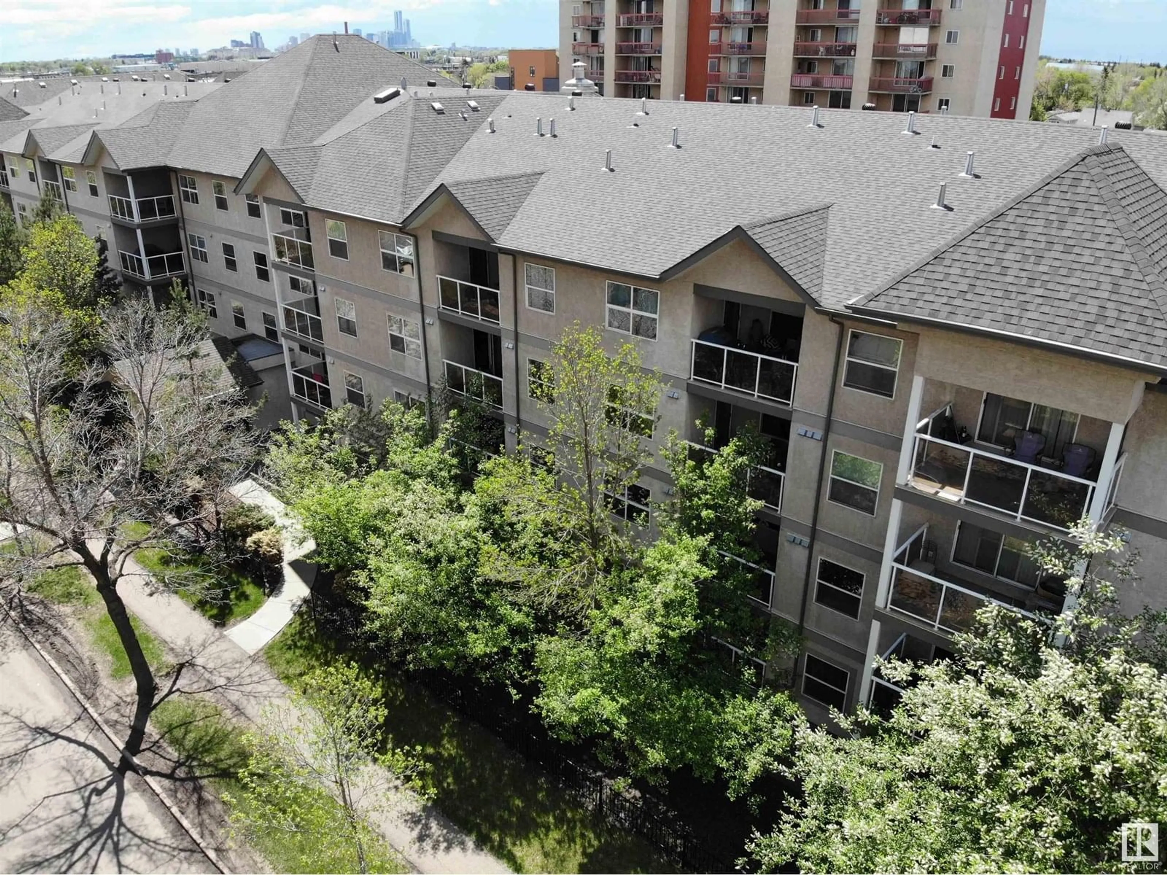 A pic from outside/outdoor area/front of a property/back of a property/a pic from drone, city buildings view from balcony for #102 - 12838 65 ST, Edmonton Alberta T5A5H3