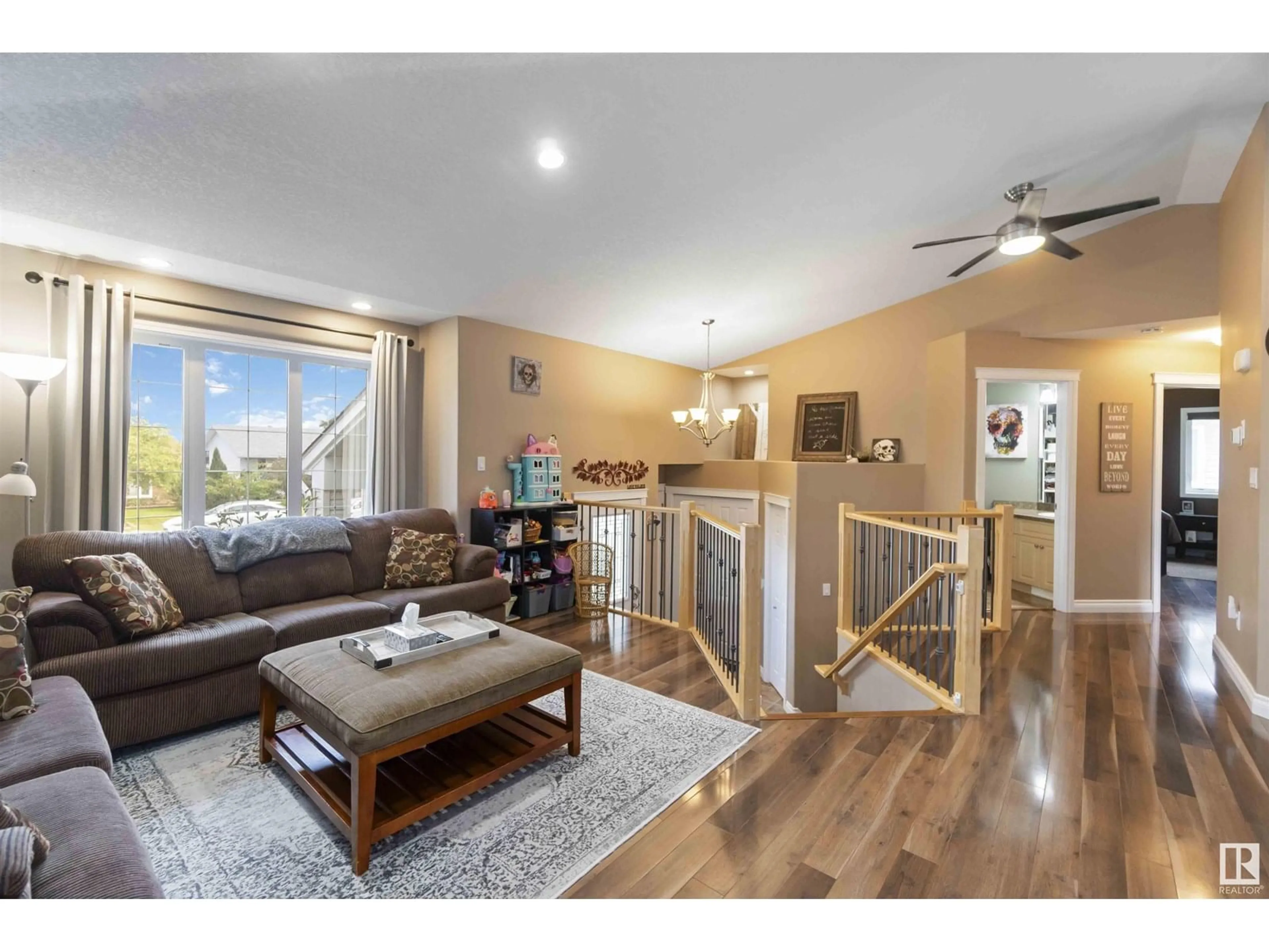 Living room with furniture, wood/laminate floor for 5320 62 ST, Redwater Alberta T0A2W0