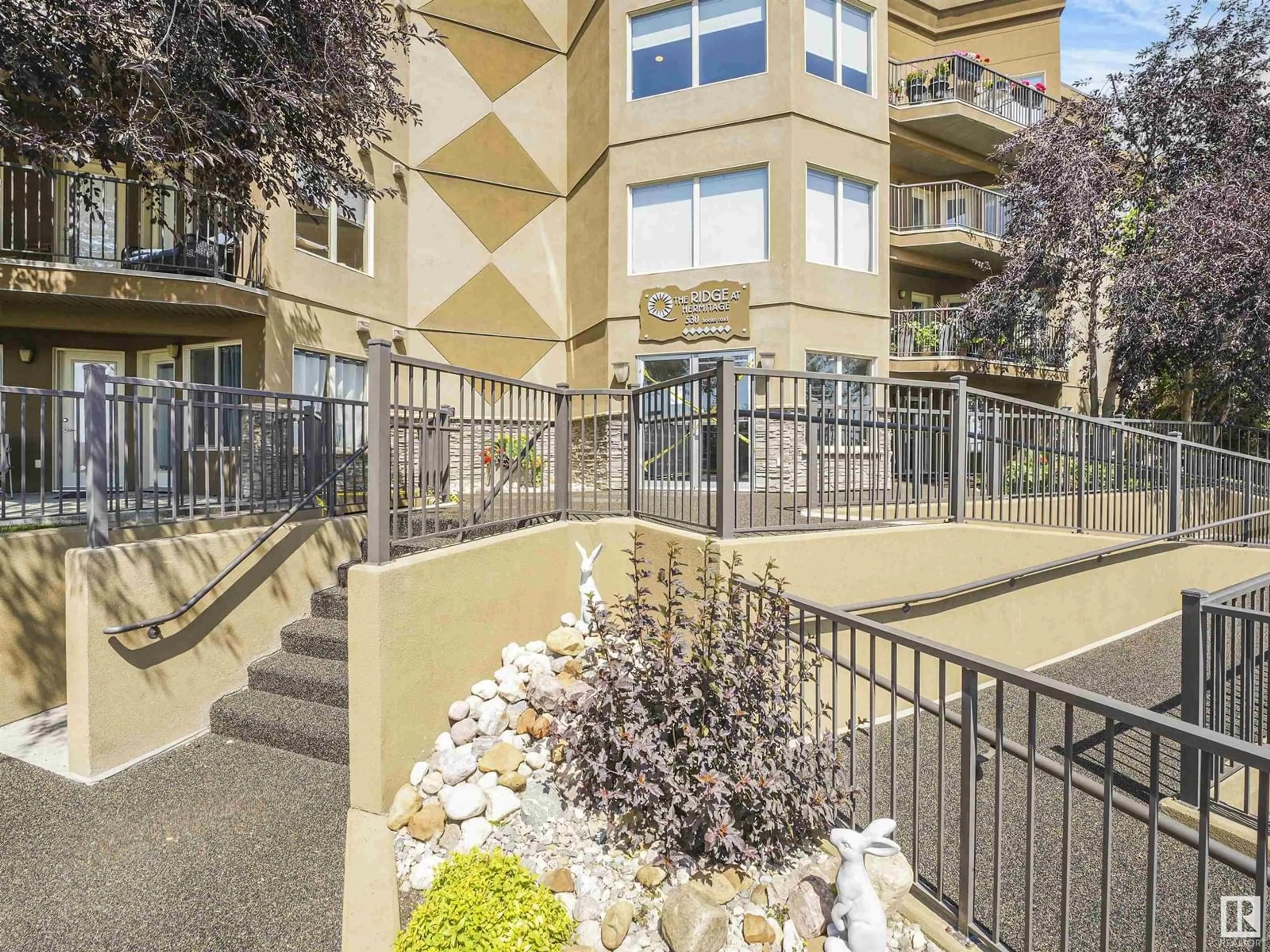 Patio, street for #213 - 530 HOOKE RD, Edmonton Alberta T5A5J5