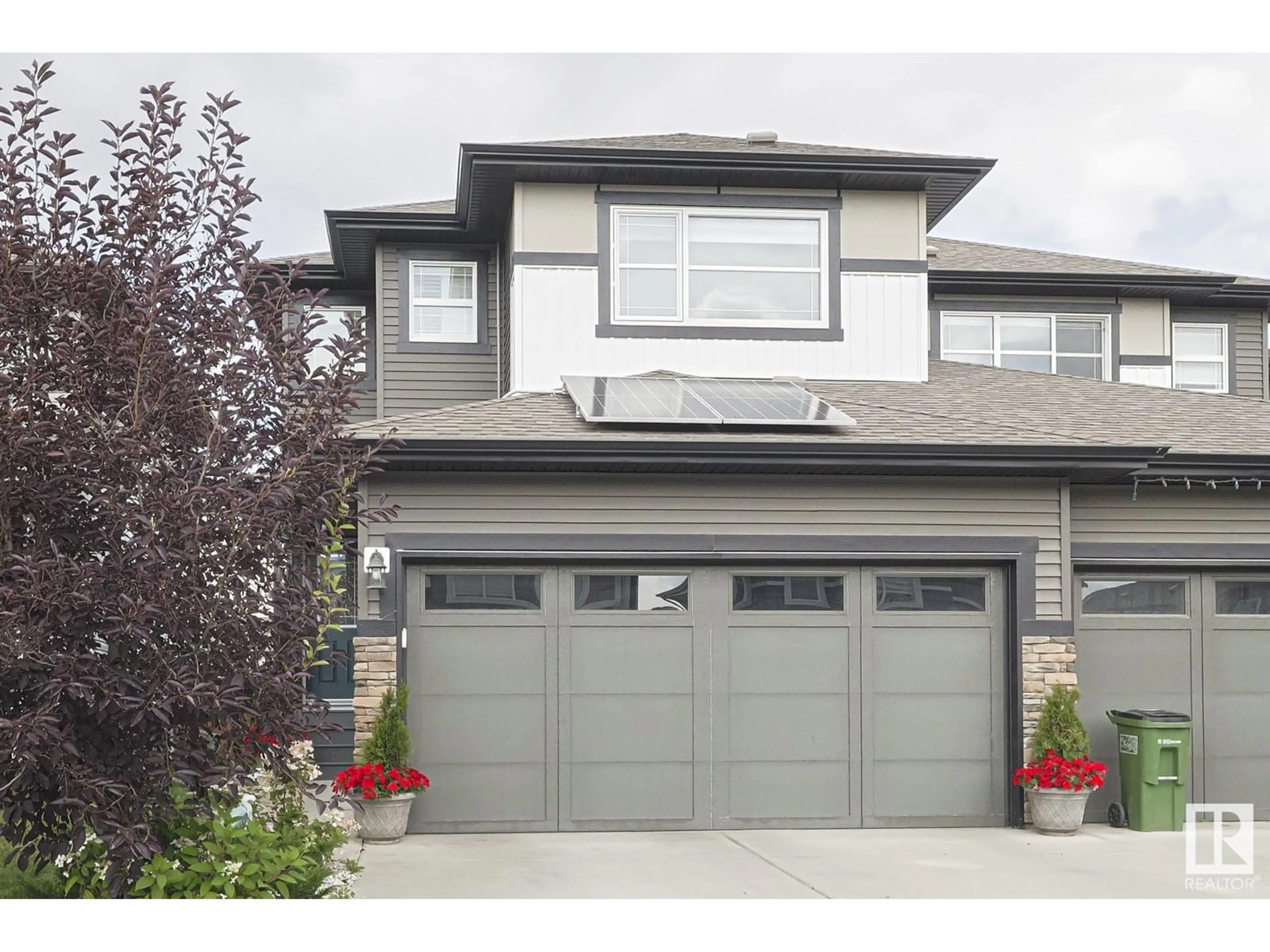 Home with vinyl exterior material, street for 1371 ERKER CR, Edmonton Alberta T6M1J4