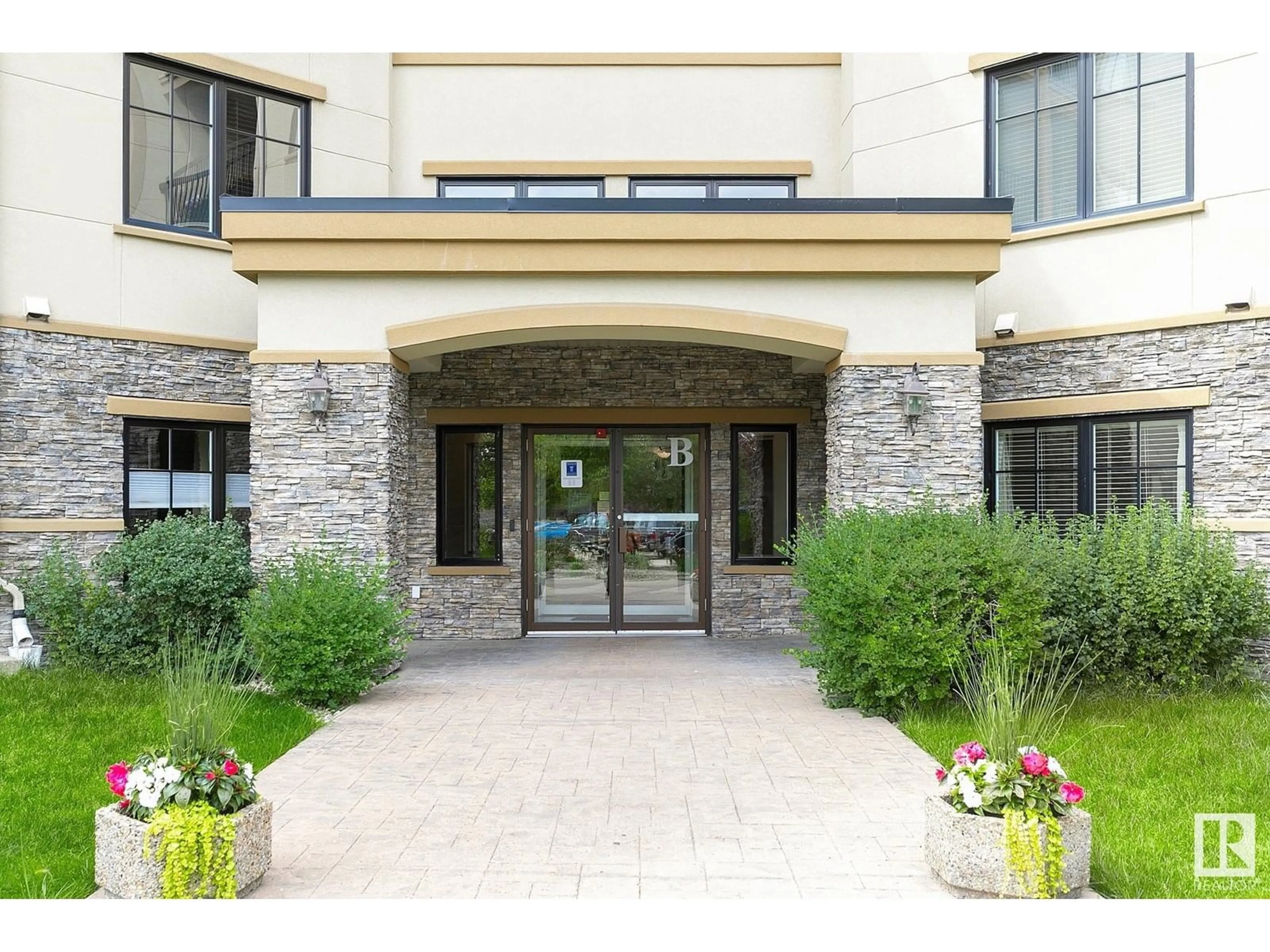 Indoor foyer for 160 - 340 MAGRATH RD, Edmonton Alberta T6R3T7