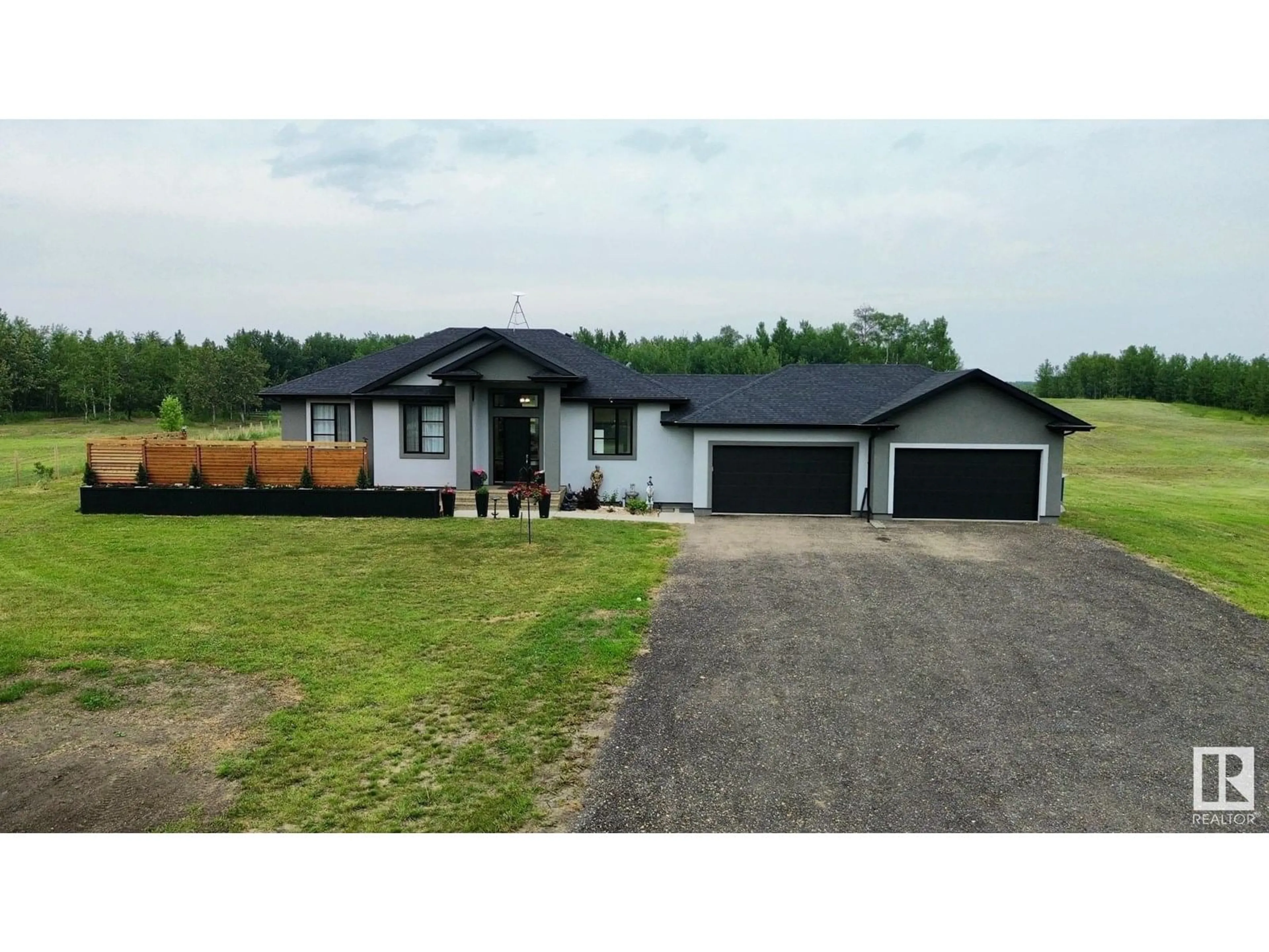 A pic from outside/outdoor area/front of a property/back of a property/a pic from drone, street for 50072 - 233 RANGE ROAD 205, Rural Camrose County Alberta T0B2M1