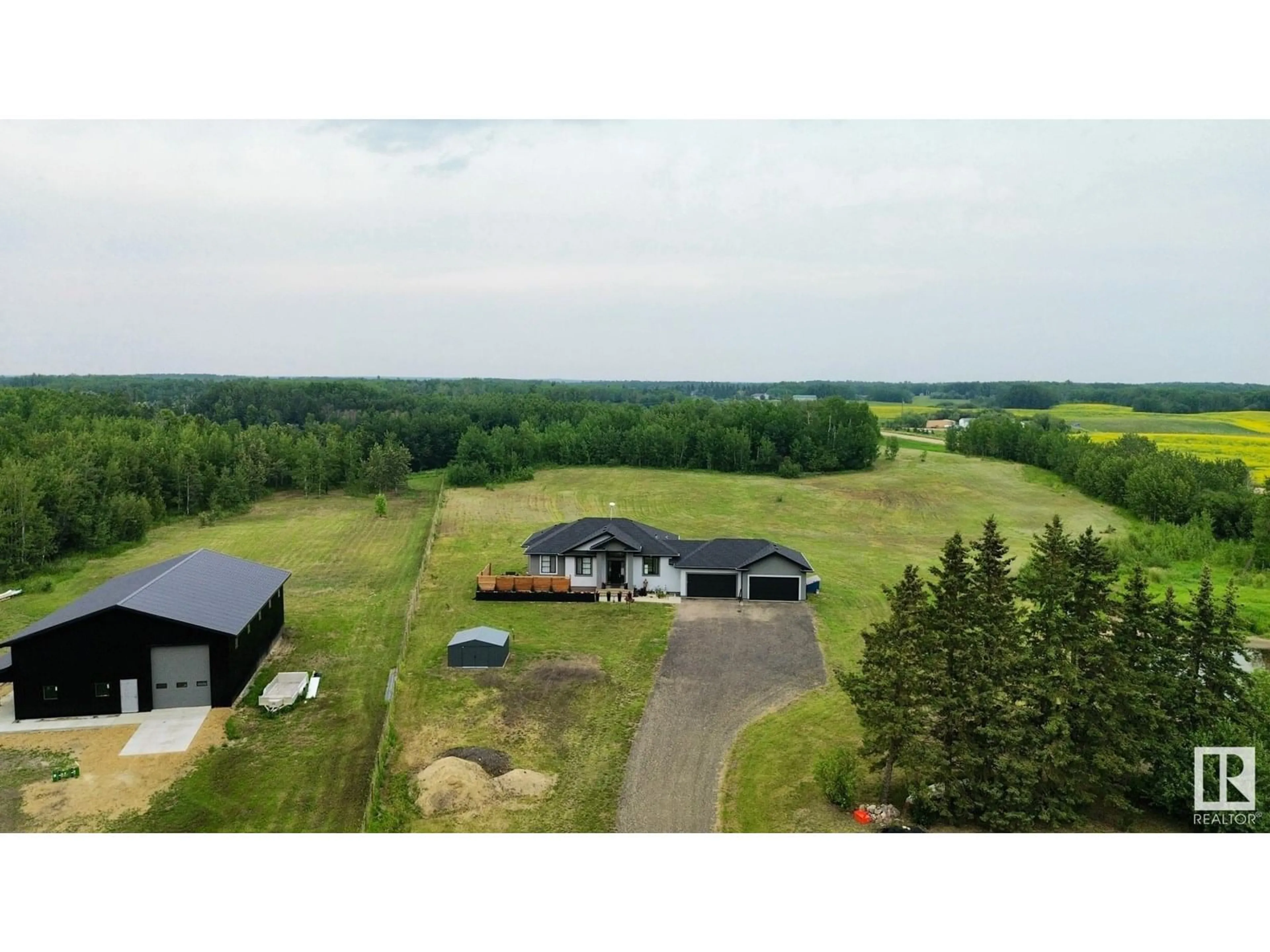 A pic from outside/outdoor area/front of a property/back of a property/a pic from drone, unknown for 50072 - 233 RANGE ROAD 205, Rural Camrose County Alberta T0B2M1