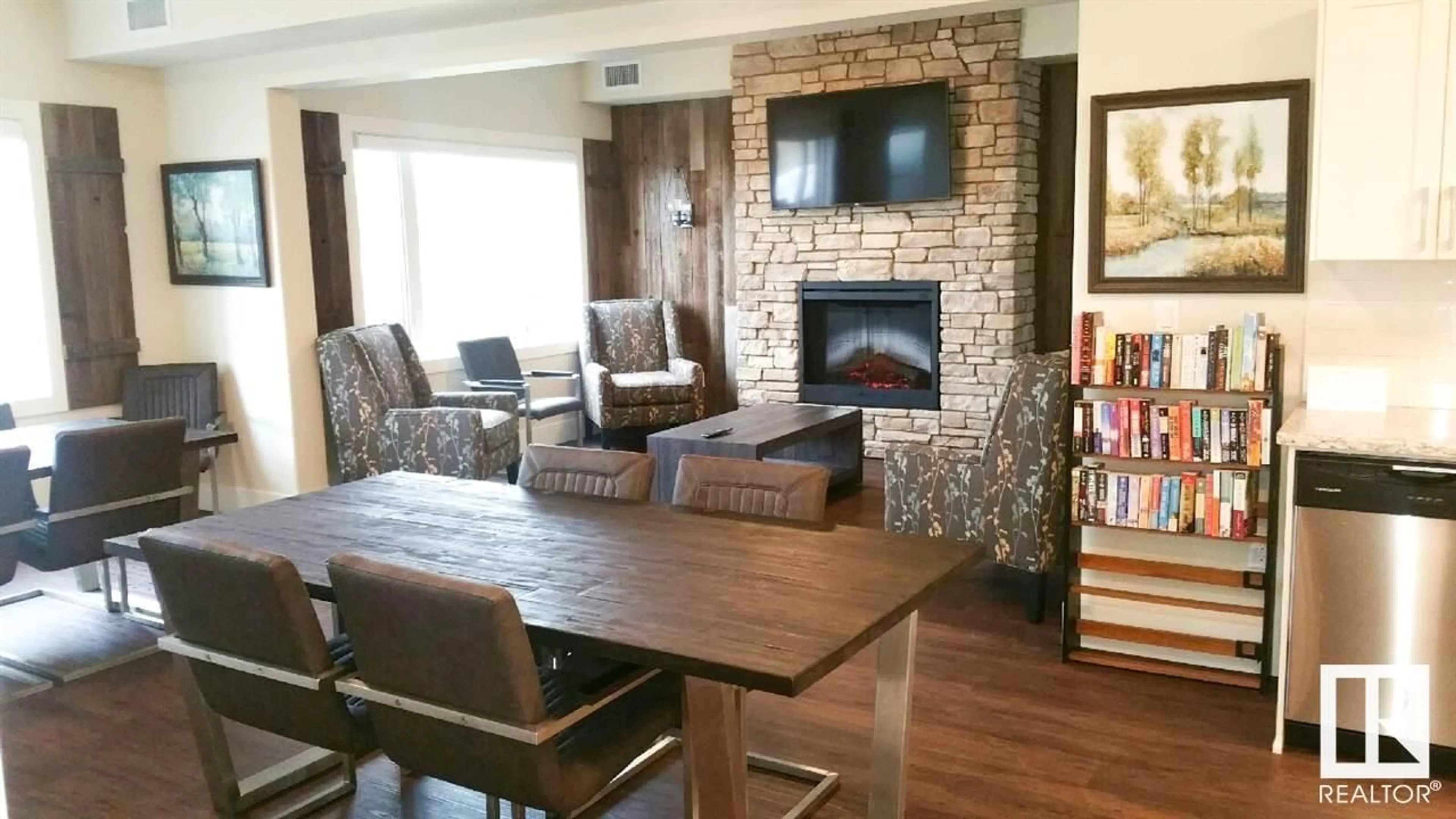 Living room with furniture, wood/laminate floor for #304 - 5001 ETON BV, Sherwood Park Alberta T8H0N7