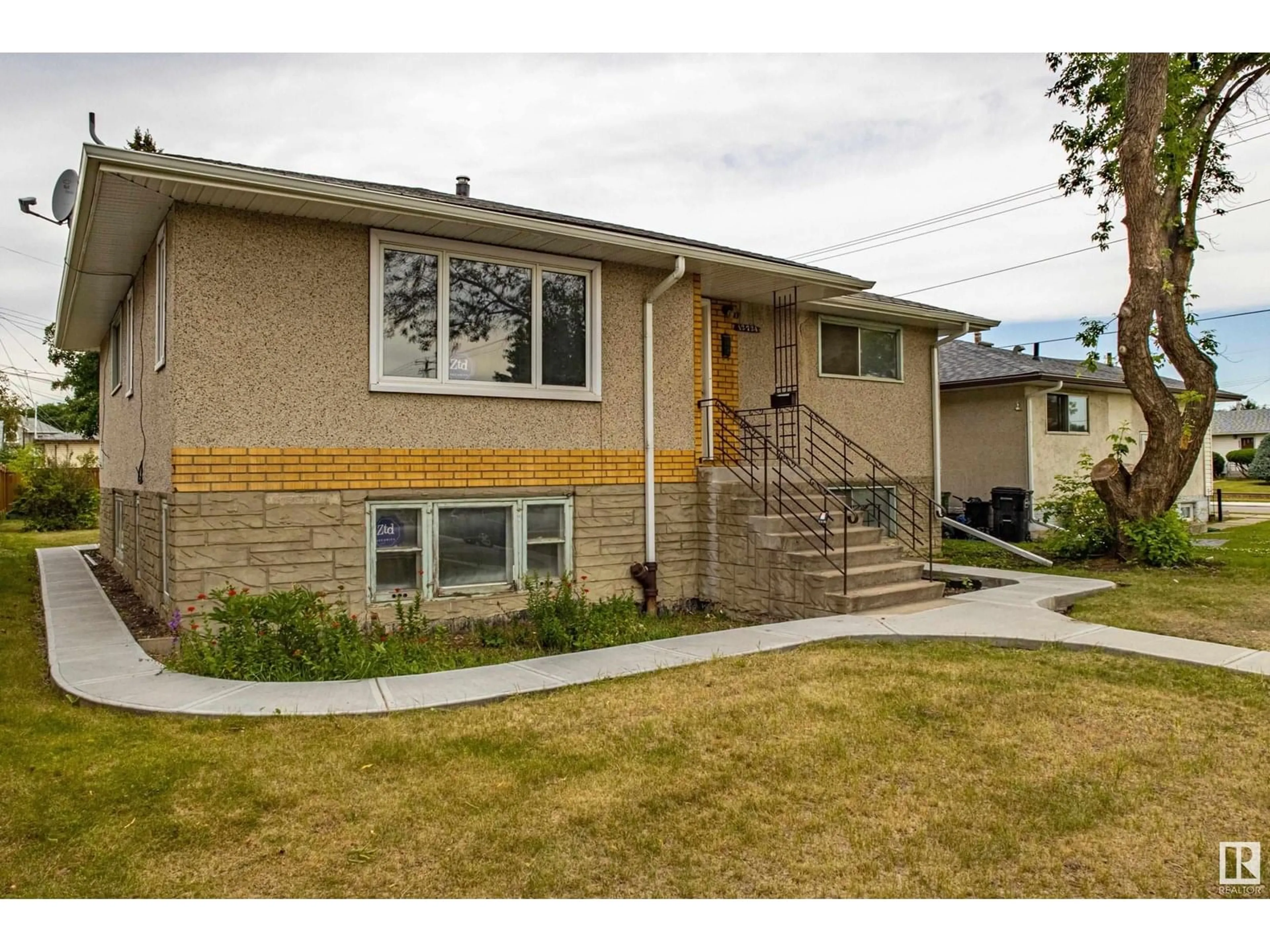 Home with brick exterior material, street for NW - 12724 92 ST, Edmonton Alberta T5E3R2