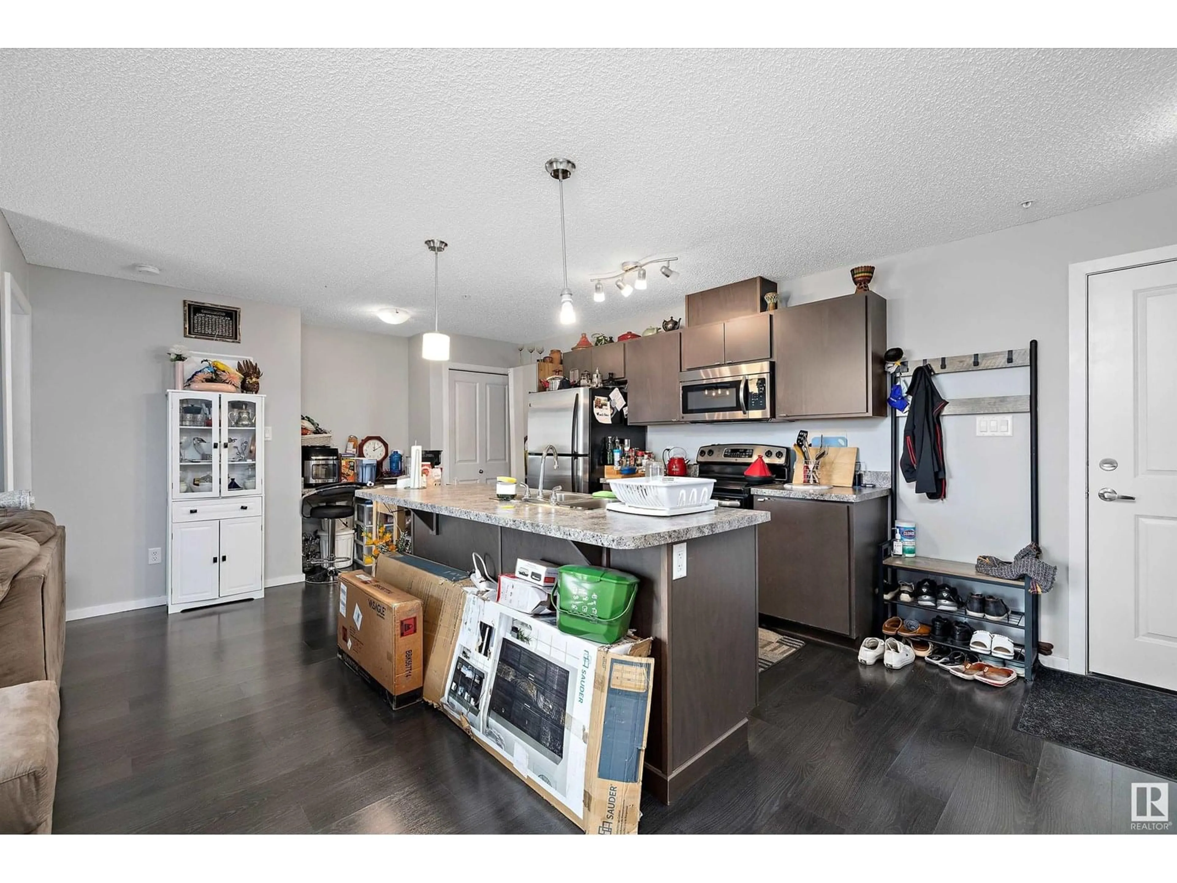 Open concept kitchen, unknown for 259 - 1196 HYNDMAN RD, Edmonton Alberta T5A0X8