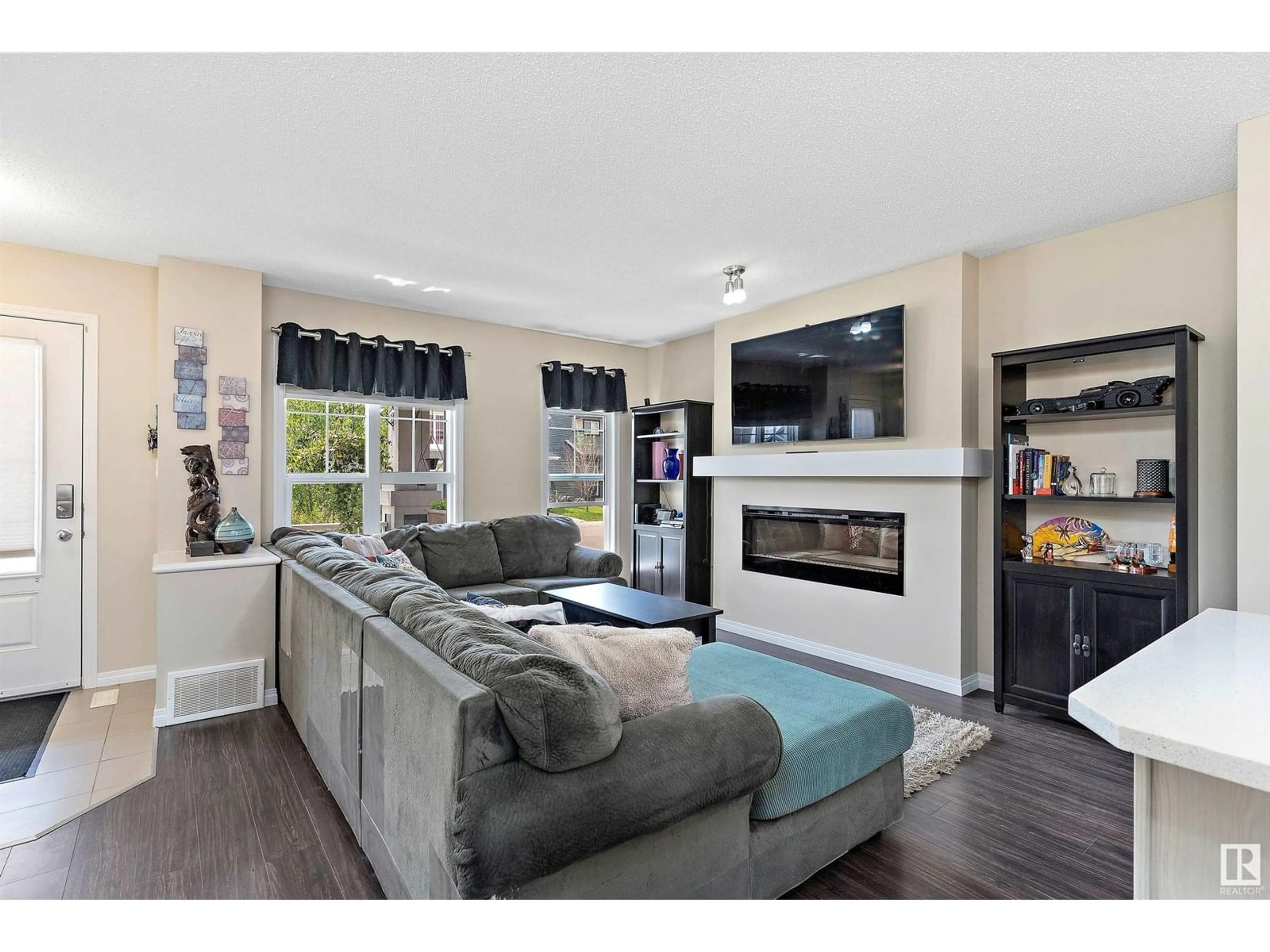 Living room with furniture, unknown for SW SW - 5665 CRABAPPLE WY, Edmonton Alberta T6X1W9