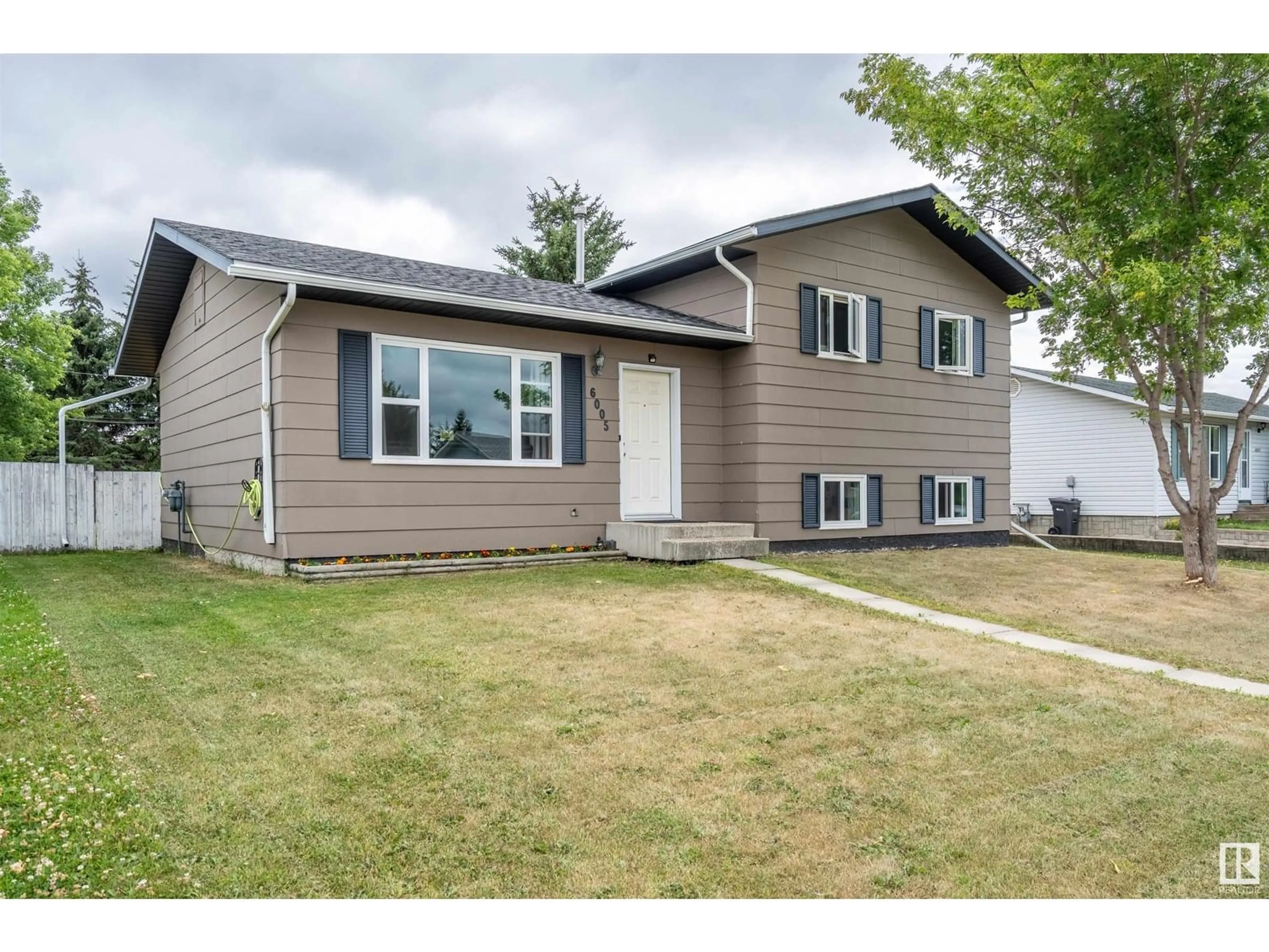 Home with vinyl exterior material, street for 6005 51 AV, Cold Lake Alberta T9M1T3