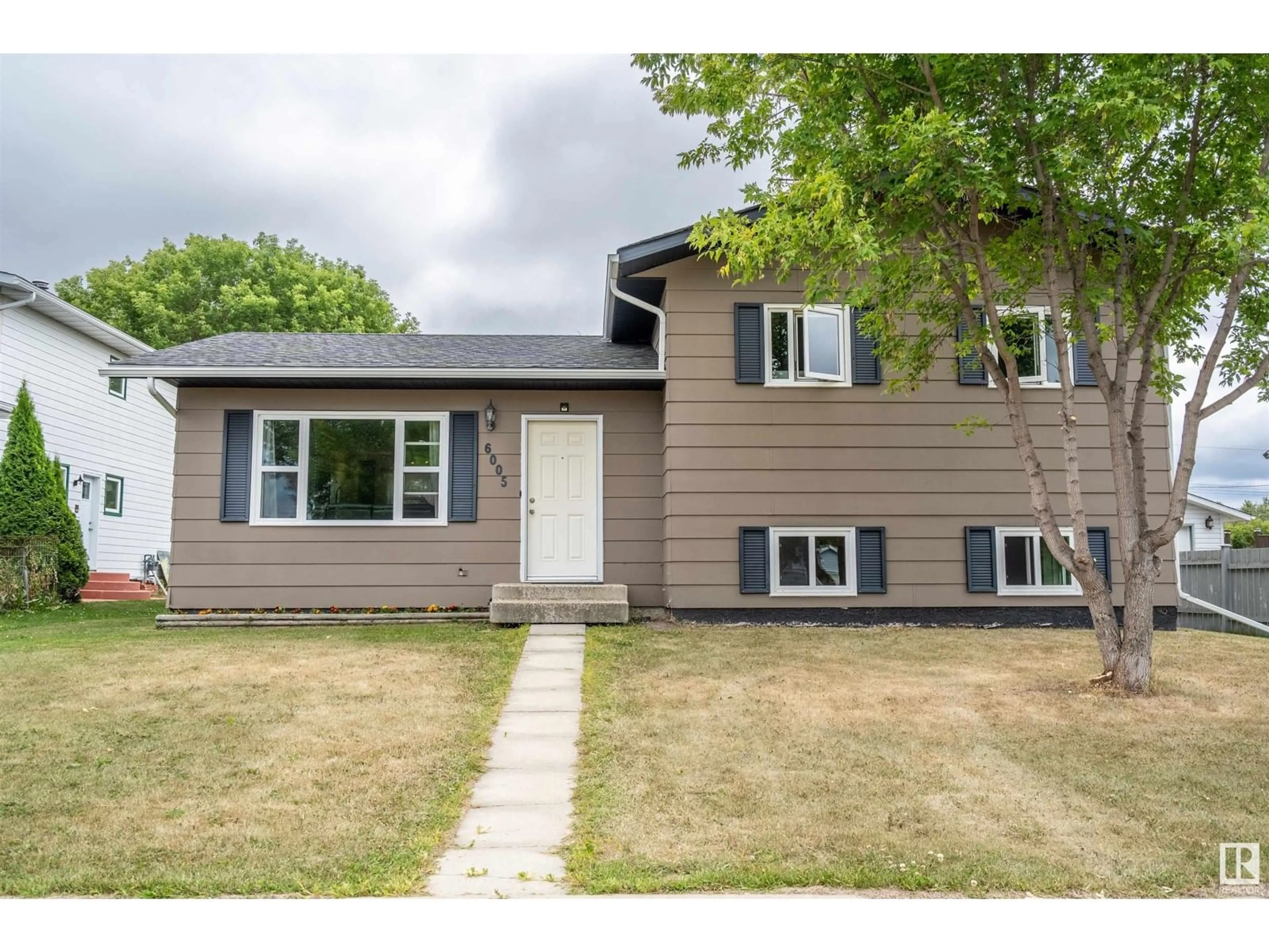 Home with vinyl exterior material, street for 6005 51 AV, Cold Lake Alberta T9M1T3