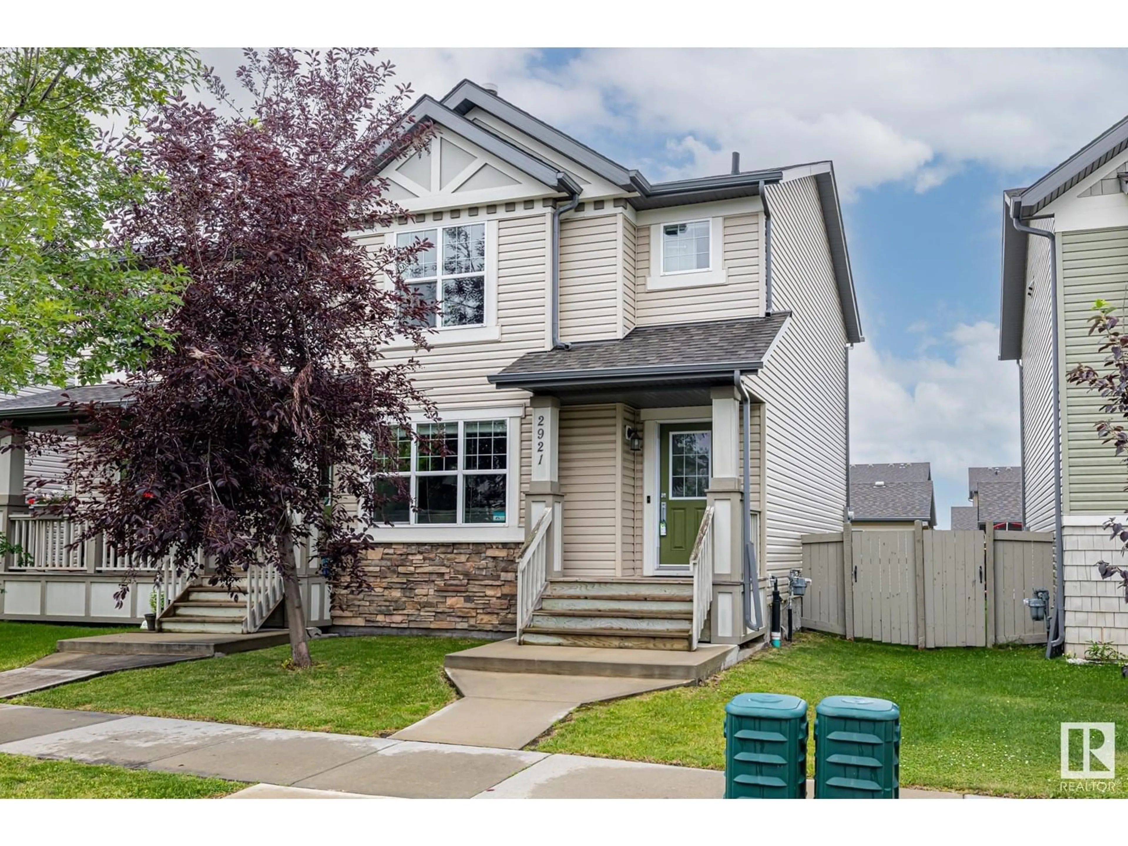 Home with vinyl exterior material, street for 2921 19 AV, Edmonton Alberta T6T0N6