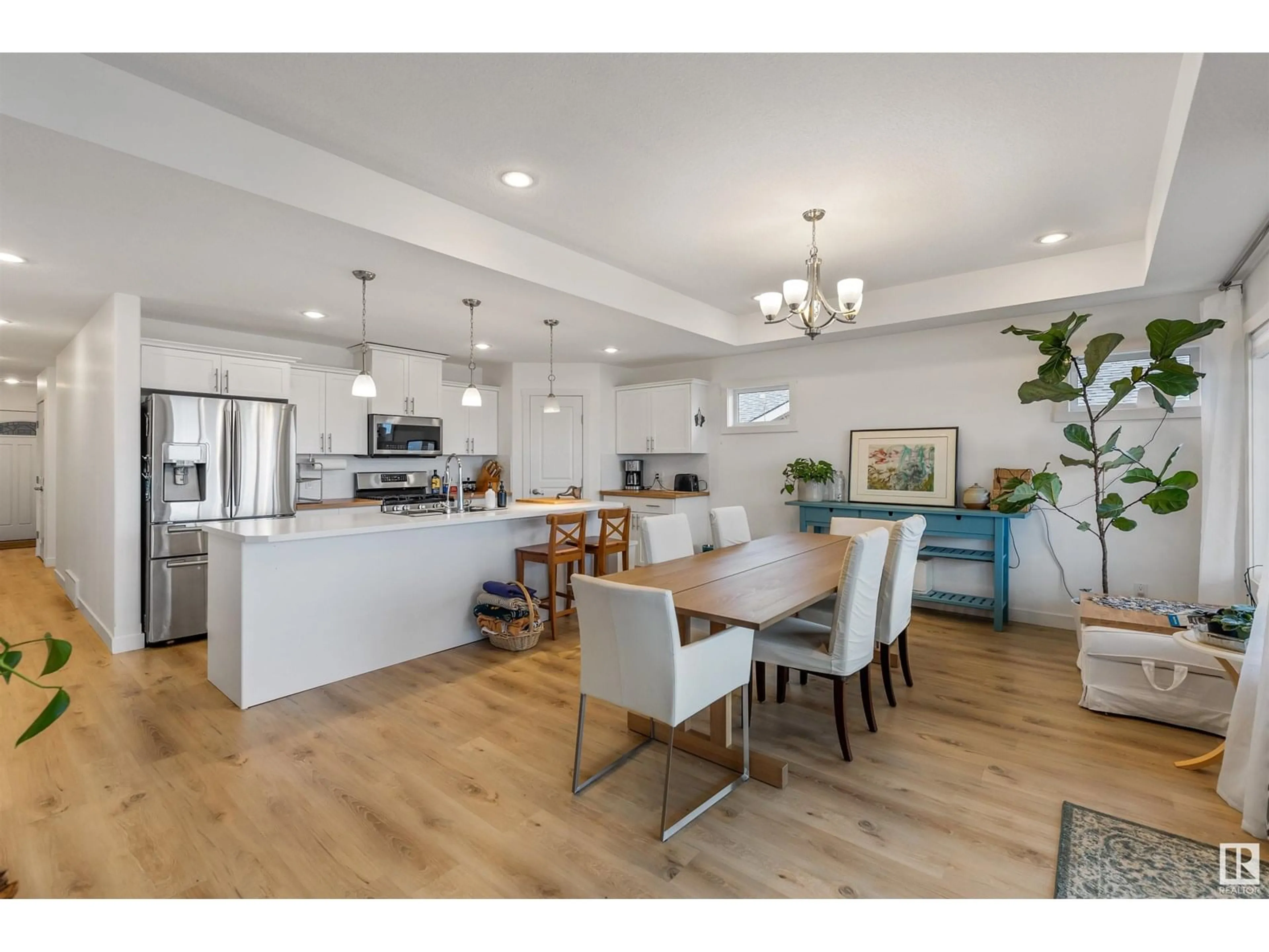 Open concept kitchen, wood/laminate floor for STE. 55101 - 321 ANNE TR, Rural Lac Ste. Anne County Alberta T0E1A1