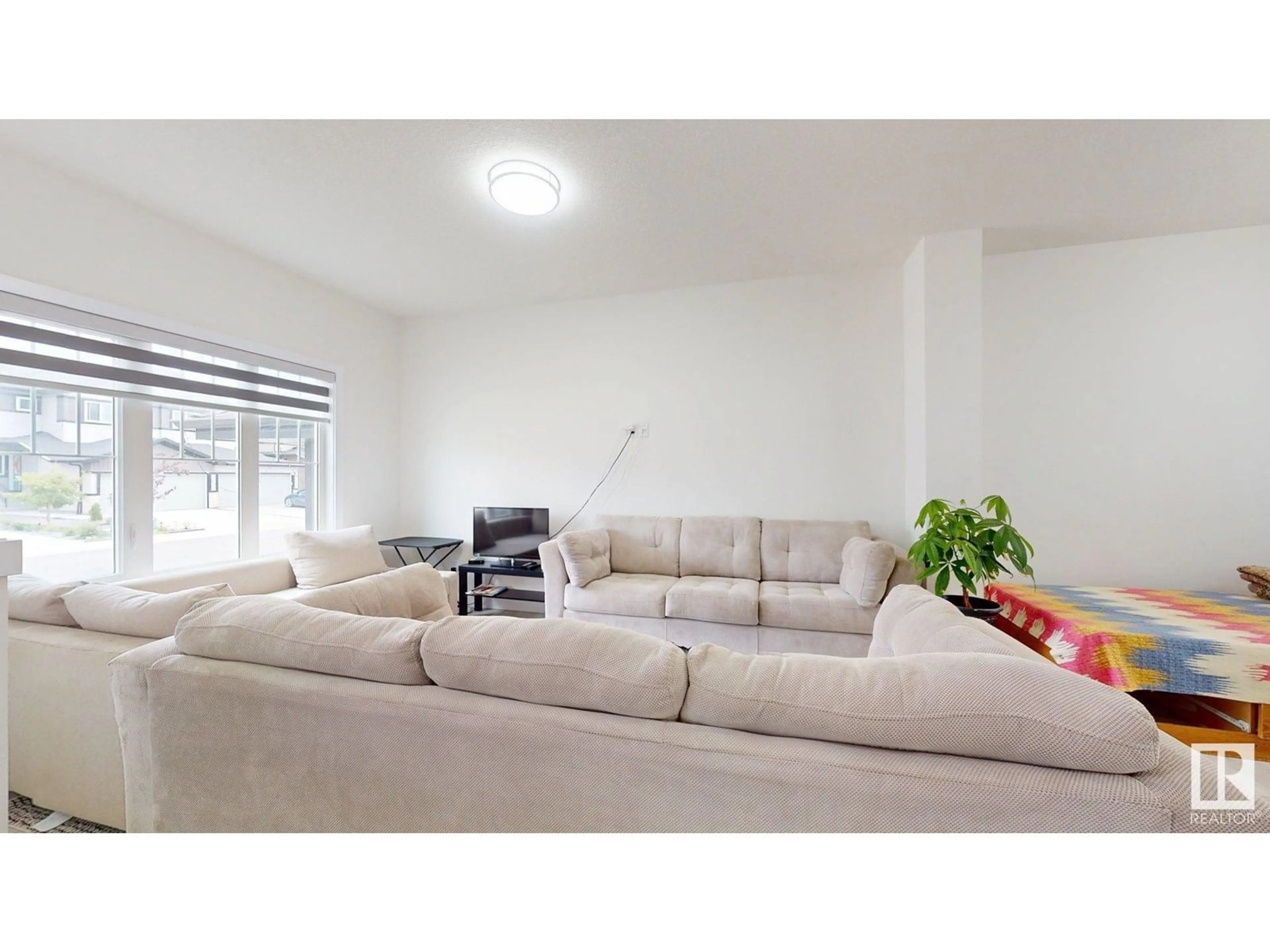 Living room with furniture, unknown for 3230 4 ST, Edmonton Alberta T6T2S9