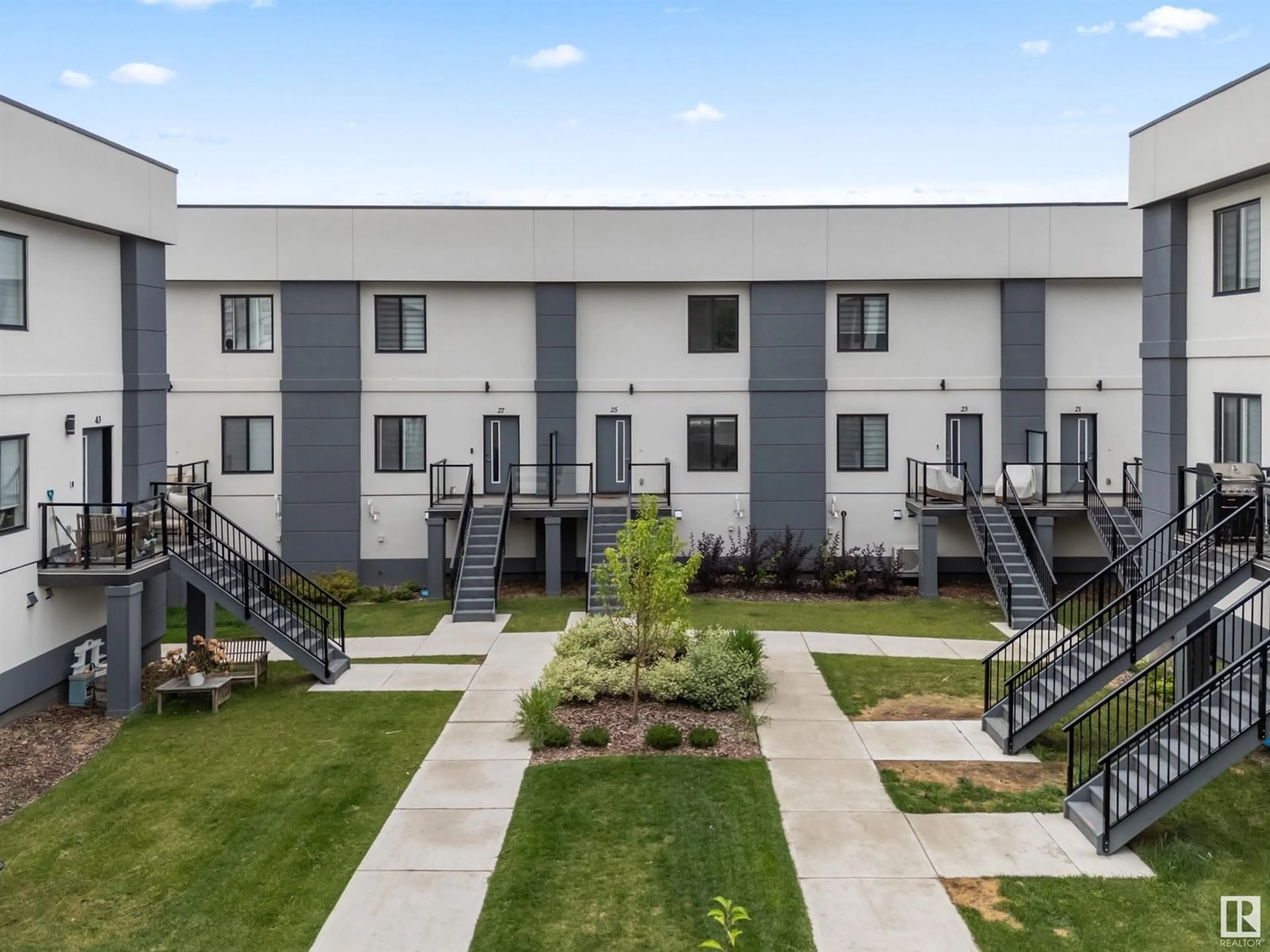 A pic from outside/outdoor area/front of a property/back of a property/a pic from drone, mountain view for 10 - 25 SALISBURY WY, Sherwood Park Alberta T8B0B1