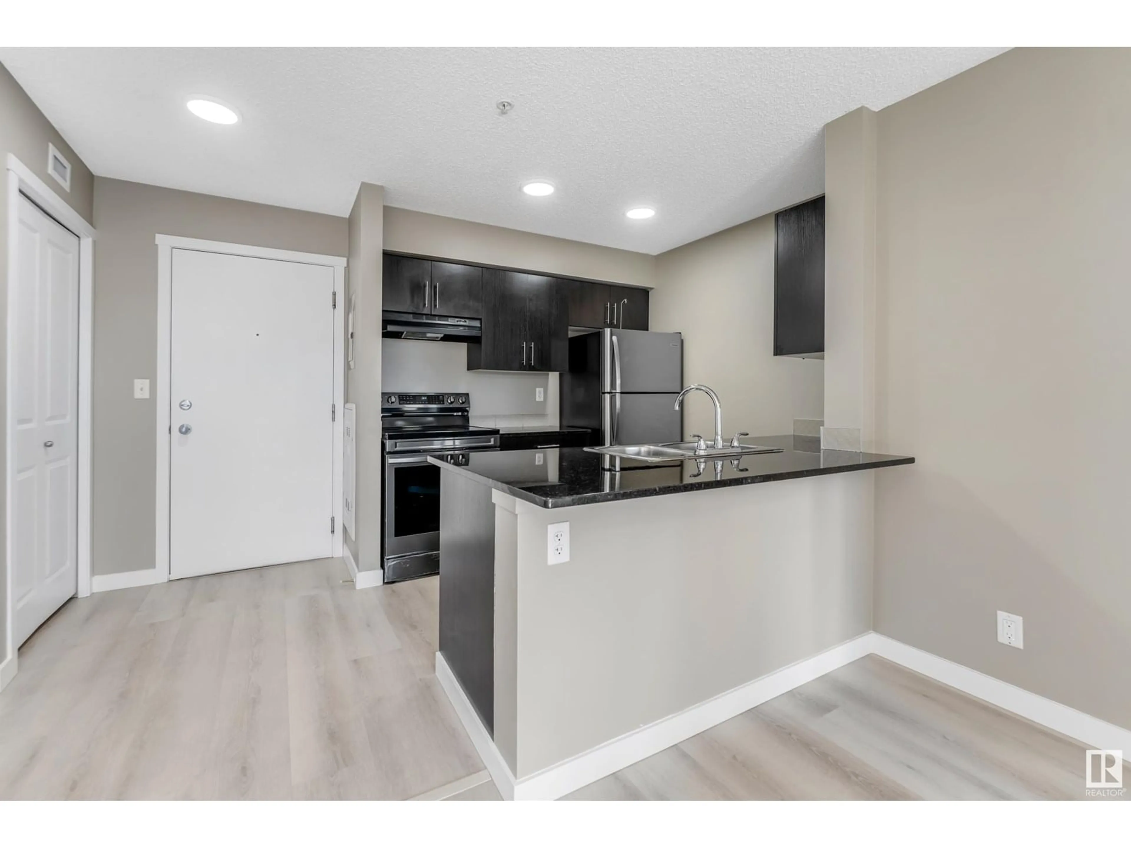 Open concept kitchen, unknown for #103 - 1510 WATT DR, Edmonton Alberta T6X2E6