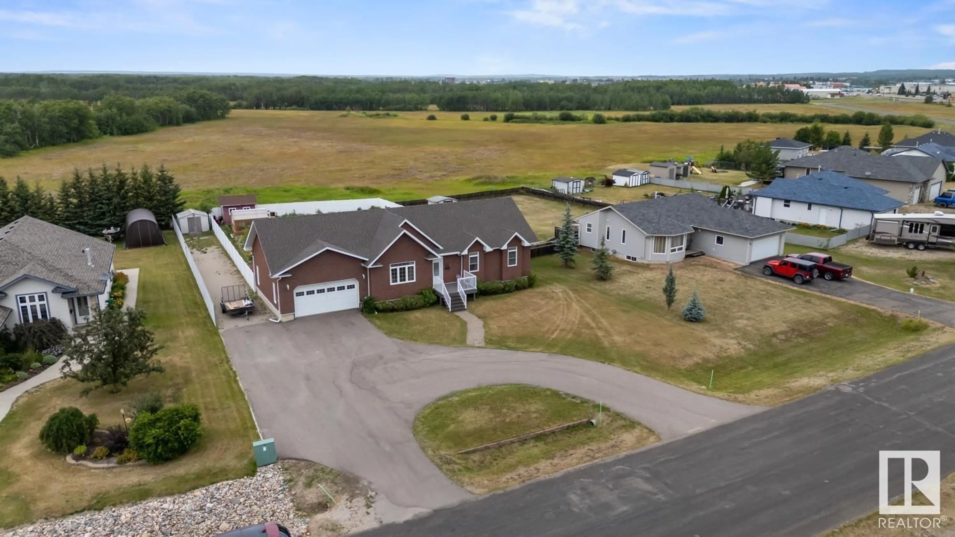 A pic from outside/outdoor area/front of a property/back of a property/a pic from drone, unknown for 3010 RED FOX DR, Cold Lake Alberta T9M1N9