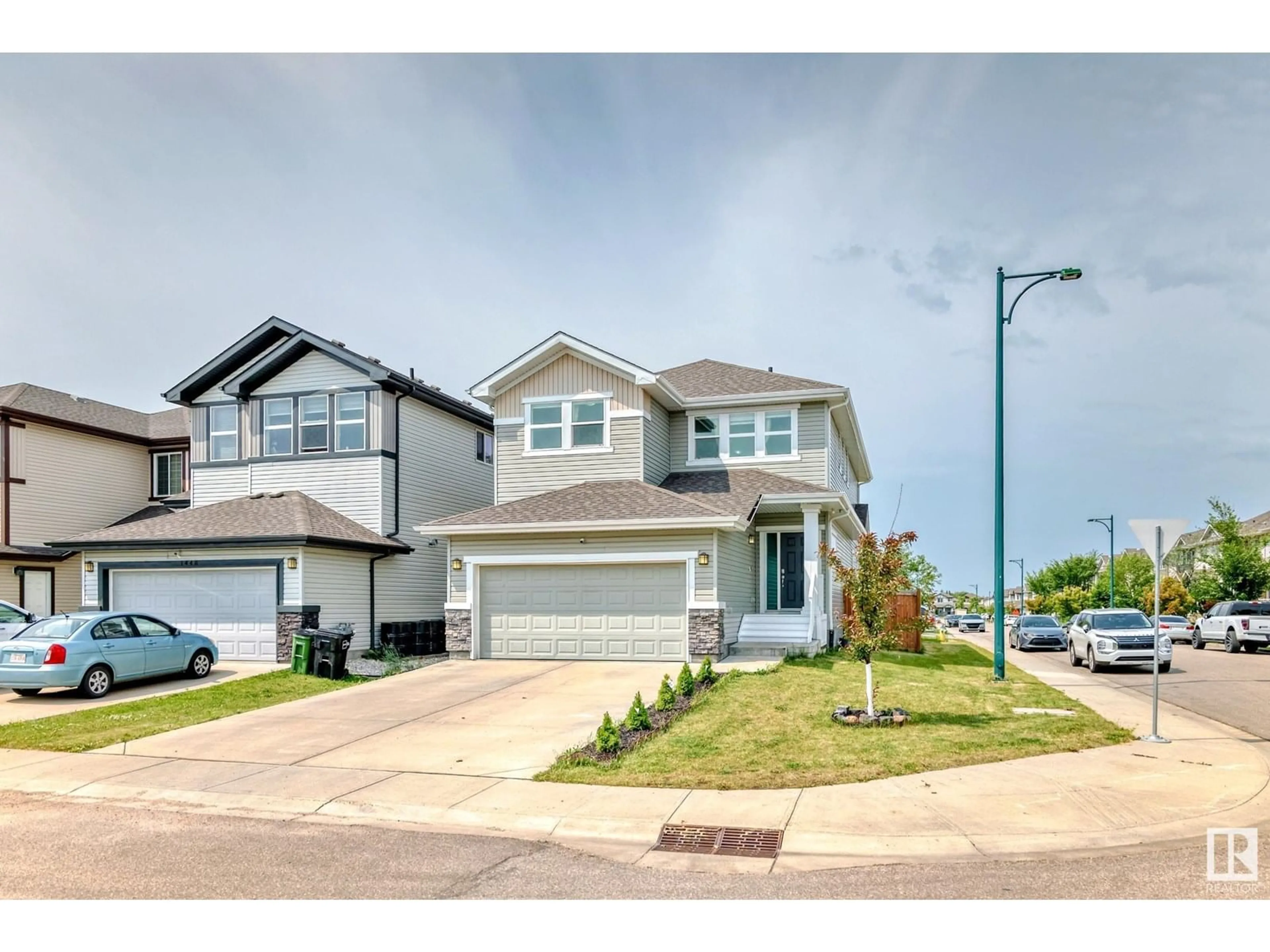 Home with vinyl exterior material, street for NW - 1452 30 ST, Edmonton Alberta T6T0Z5