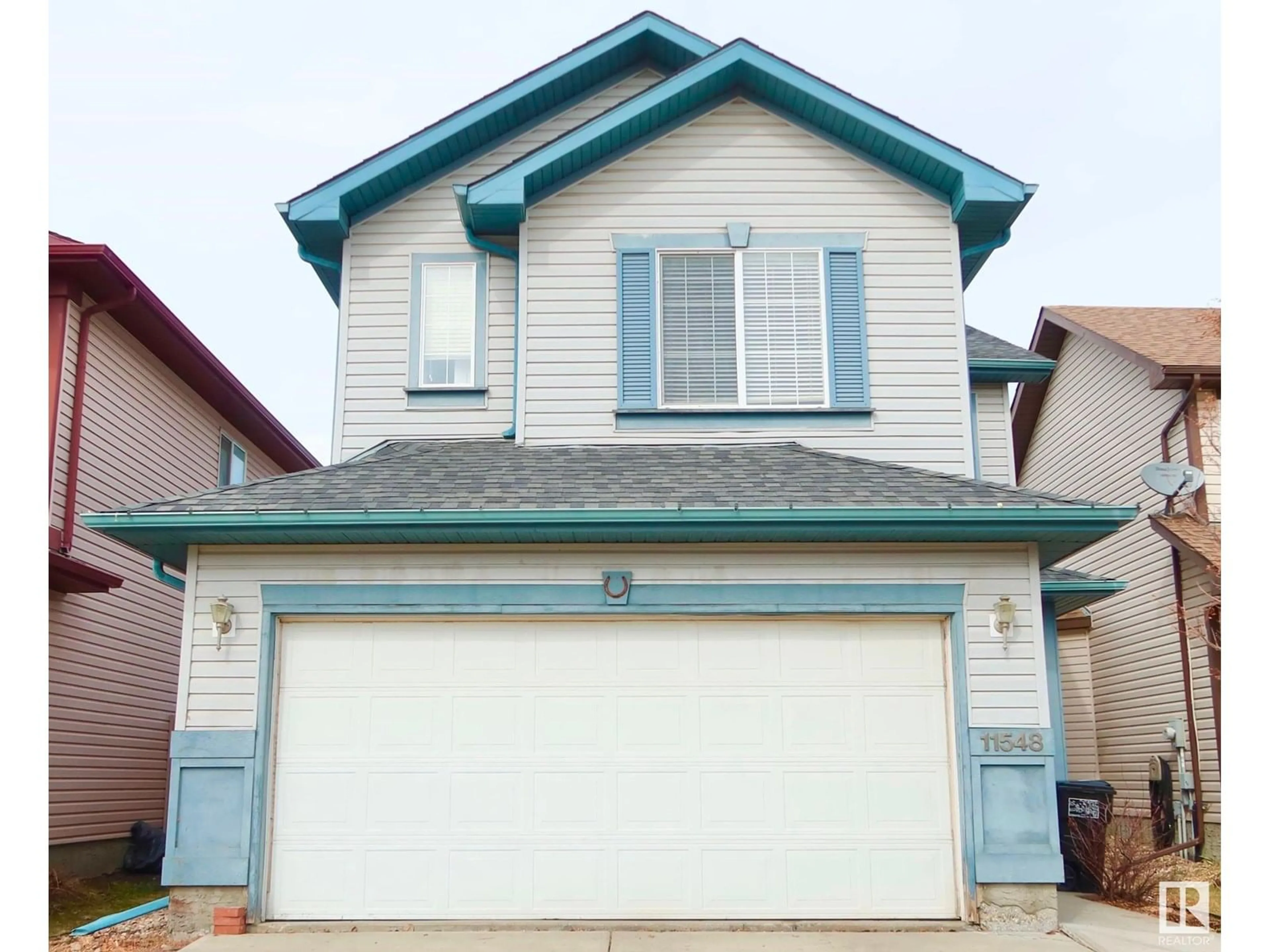Home with vinyl exterior material, street for 11548 167A AV, Edmonton Alberta T5X6G9
