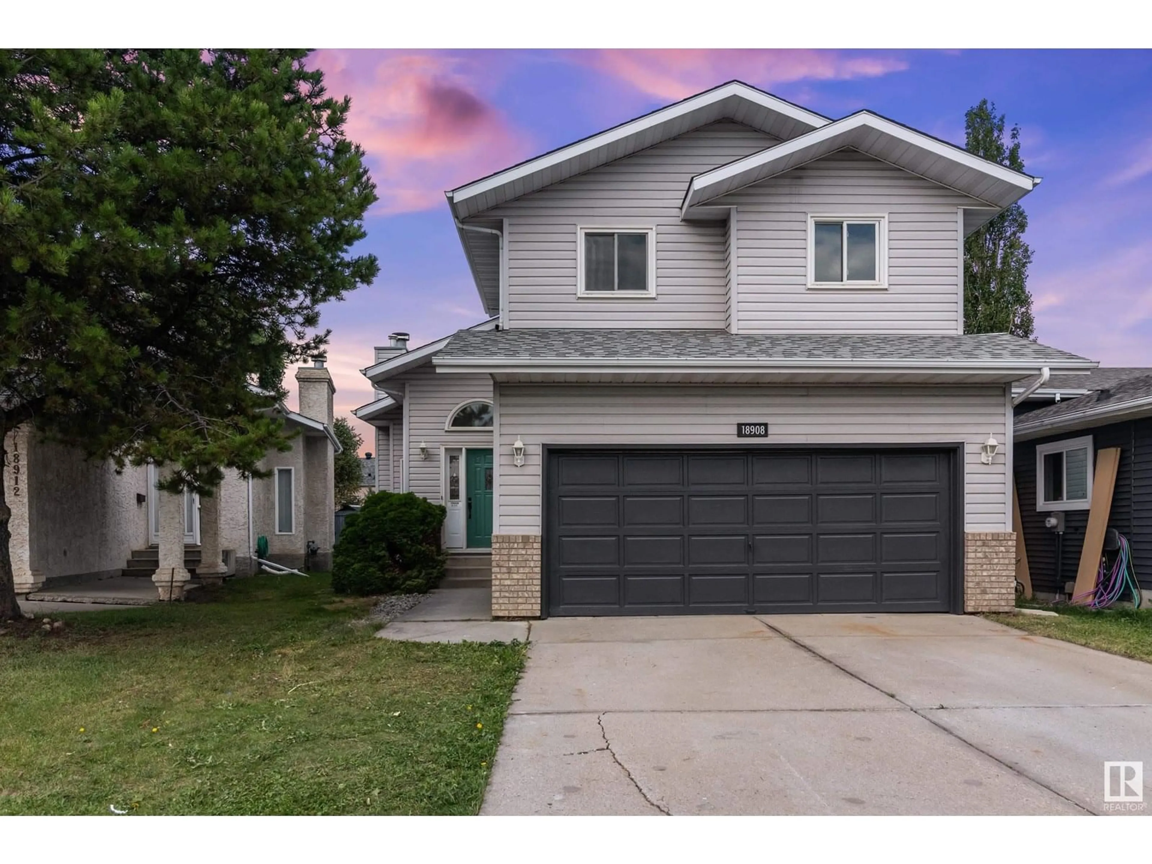 Home with vinyl exterior material, street for NW - 18908 58 AV, Edmonton Alberta T6M2G6