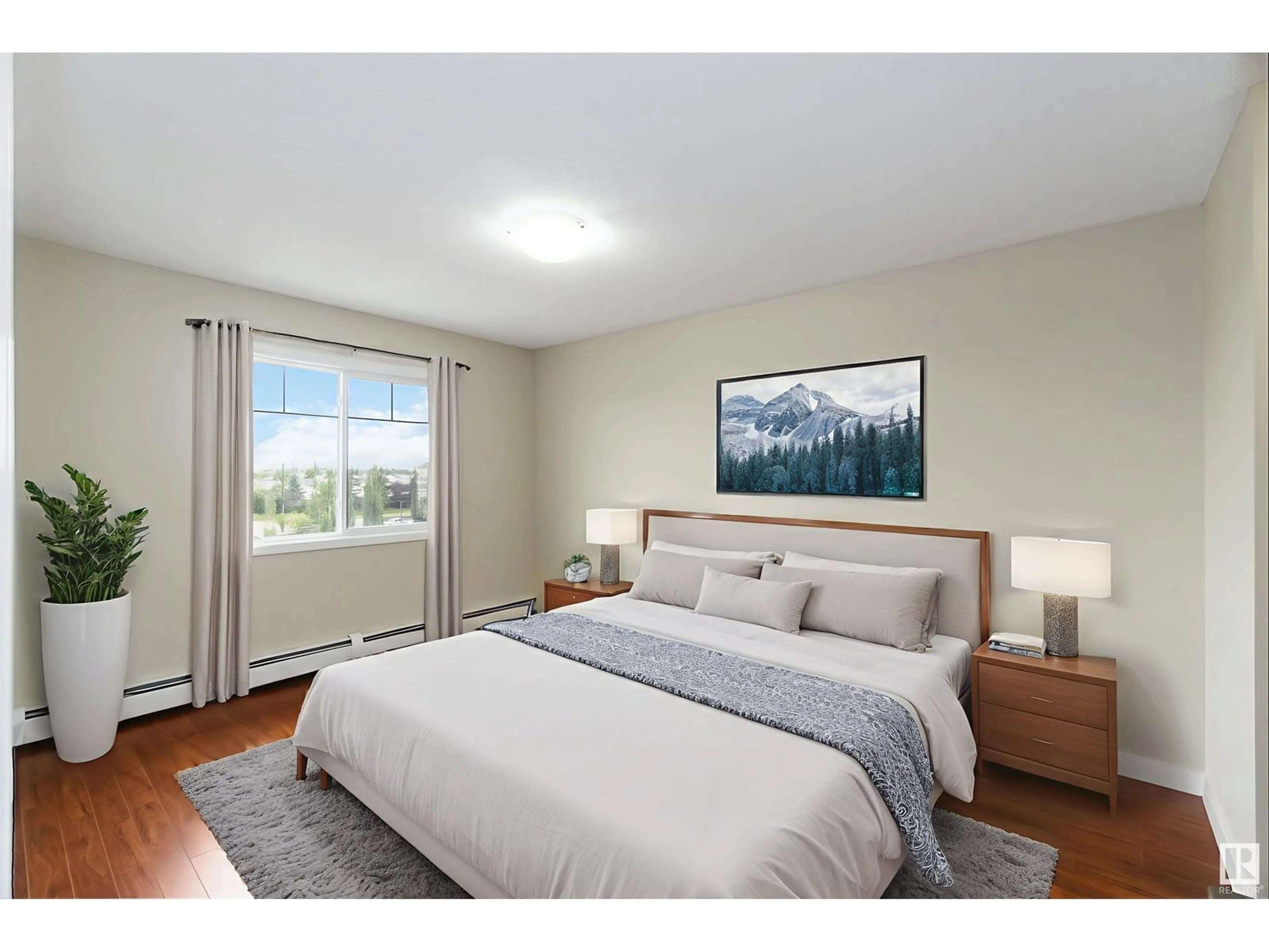 Bedroom with bed, wood/laminate floor for #417 - 12650 142 AVE, Edmonton Alberta T5X0J4