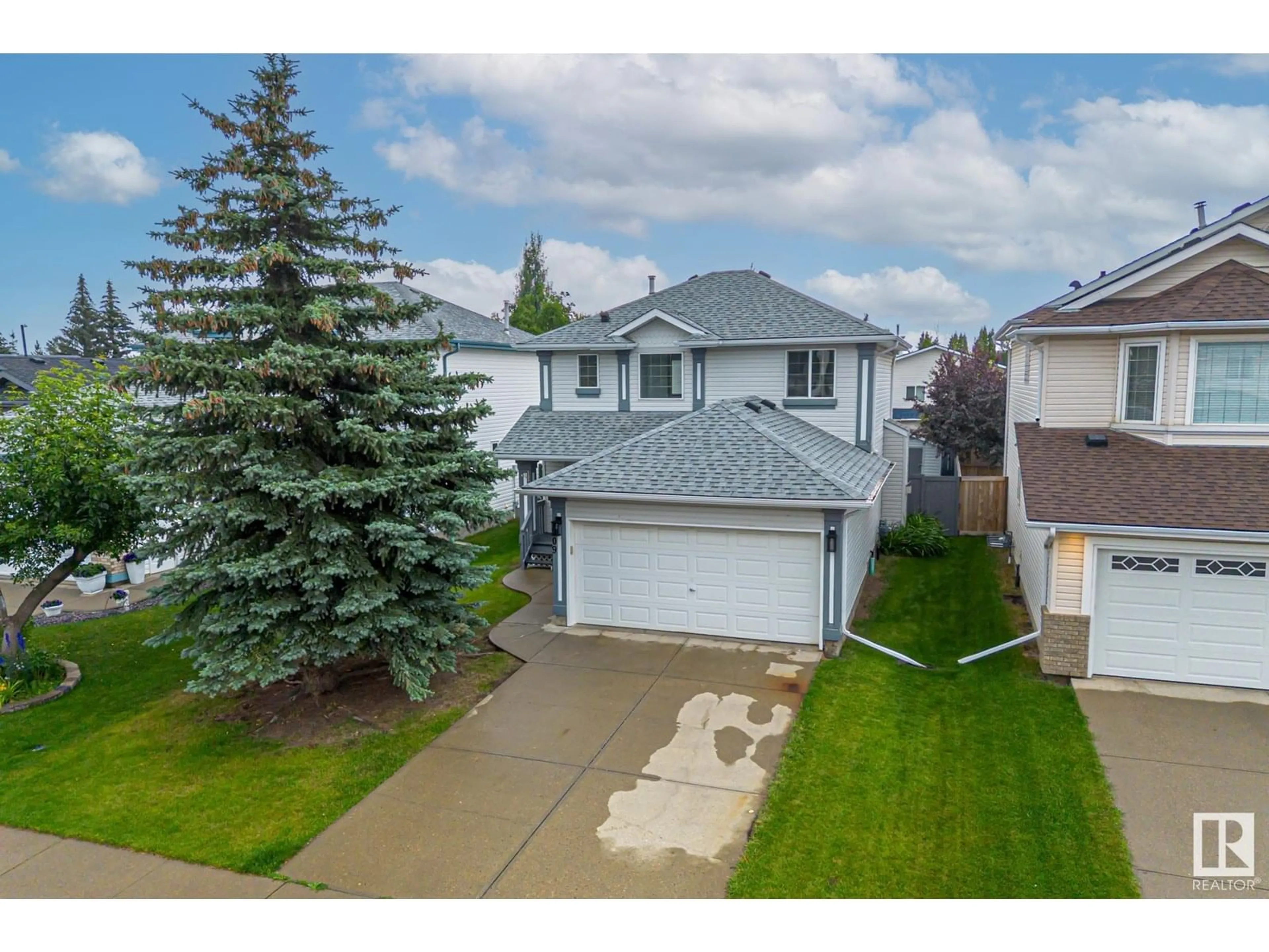 A pic from outside/outdoor area/front of a property/back of a property/a pic from drone, street for NW - 209 BANCROFT CL, Edmonton Alberta T5T6B5