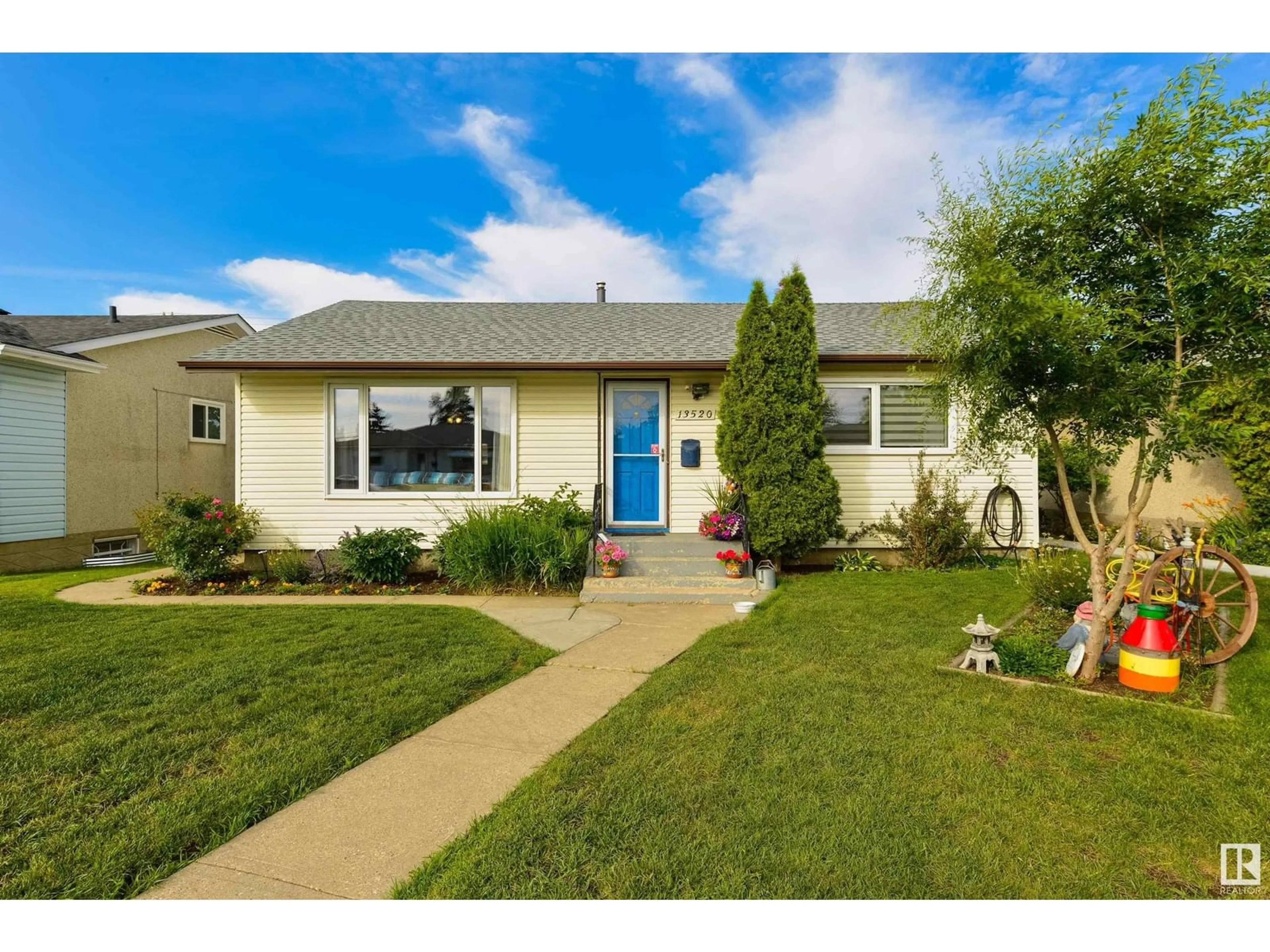 Home with vinyl exterior material, street for 13520 104A ST NW, Edmonton Alberta T5E4R2