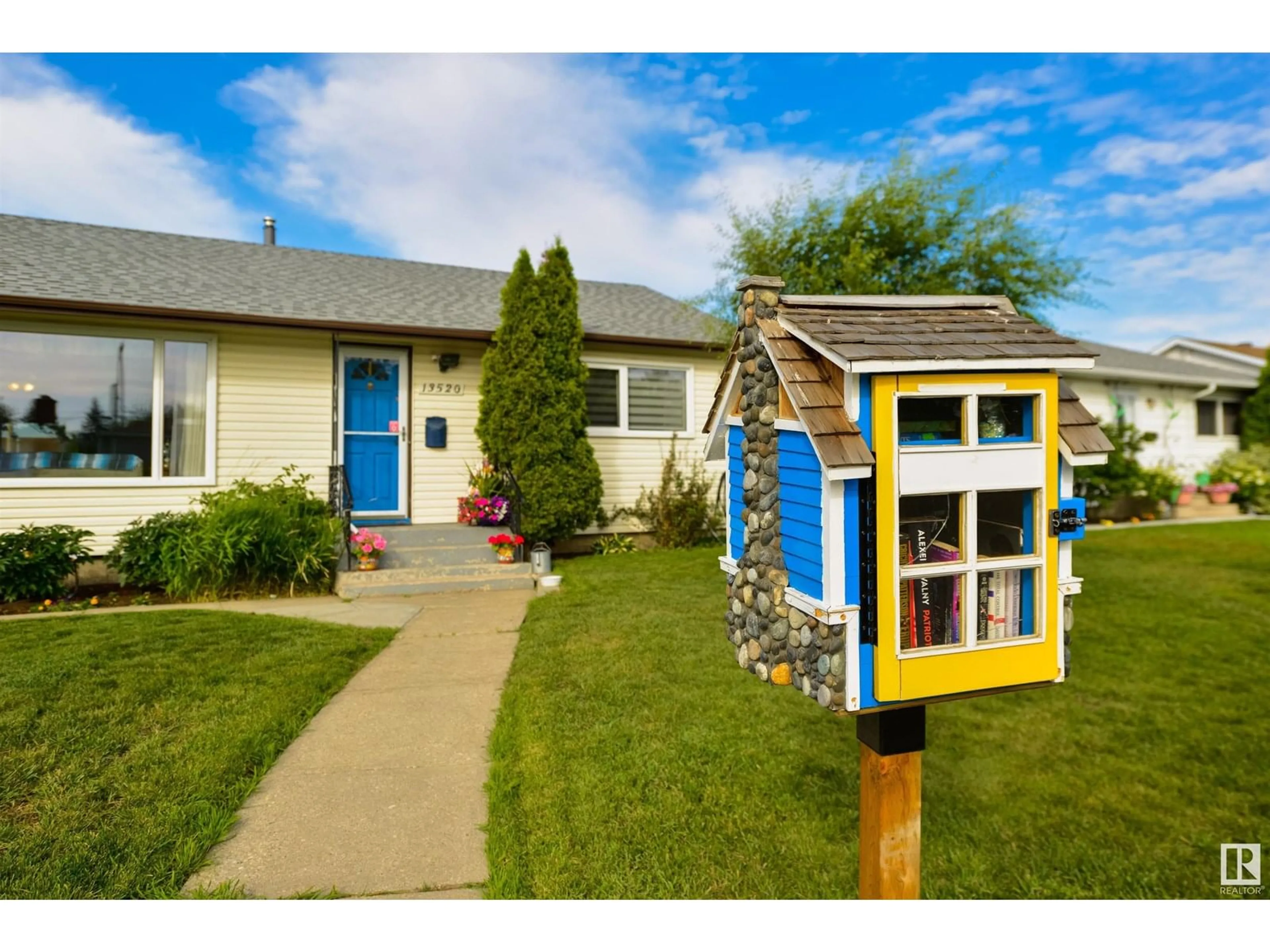 Home with vinyl exterior material, street for 13520 104A ST NW, Edmonton Alberta T5E4R2