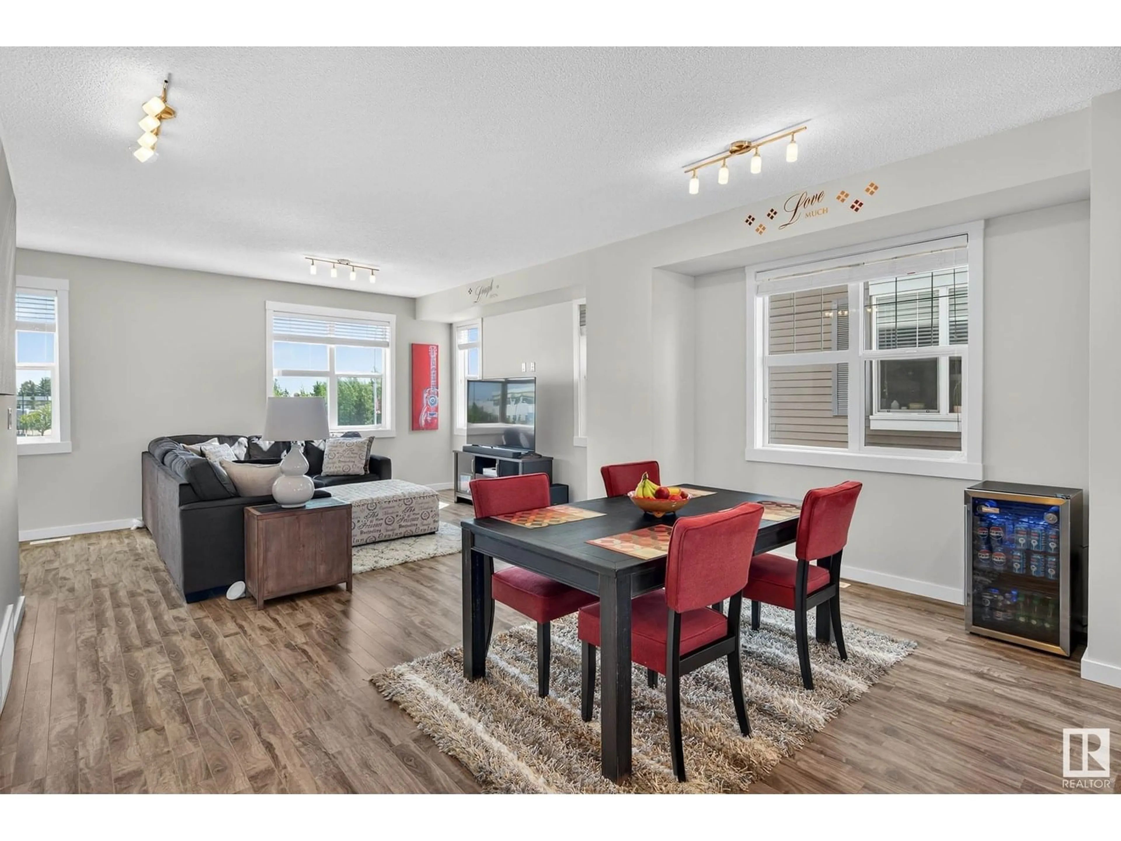 Dining room, wood/laminate floor for #108 - 8530 94 ST, Fort Saskatchewan Alberta T8L0V8
