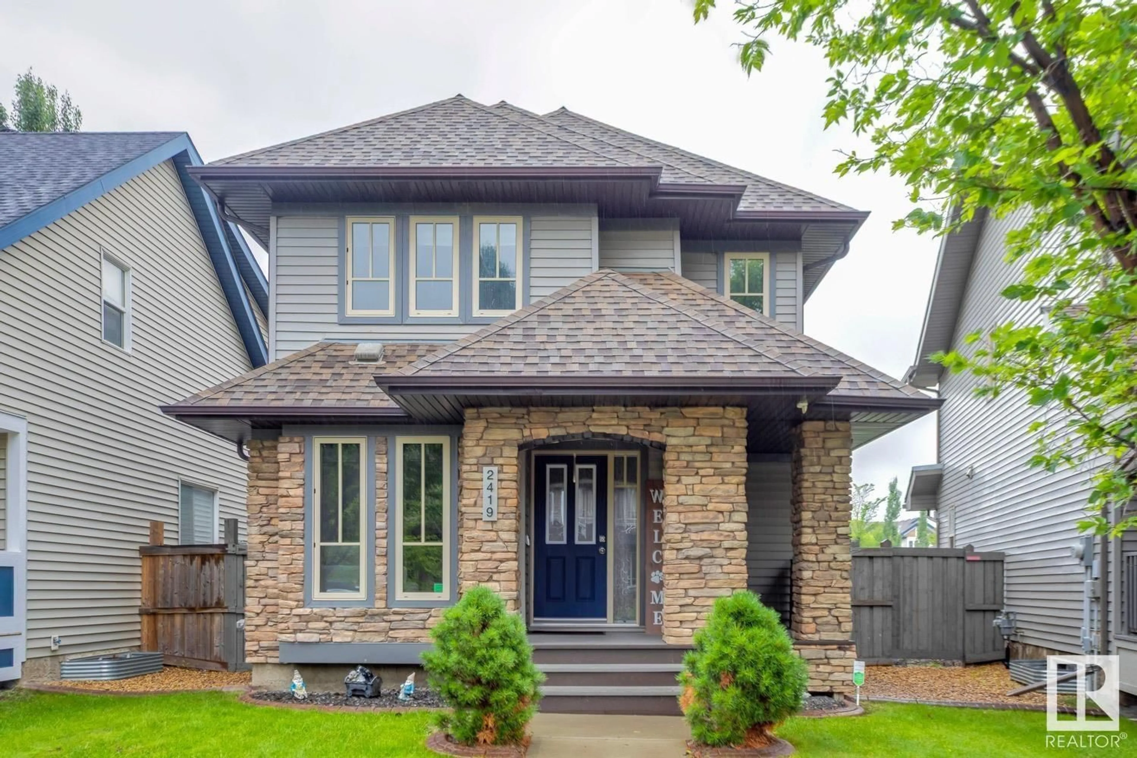 Home with brick exterior material, street for 2419 AUSTIN CR, Edmonton Alberta T6W0L3