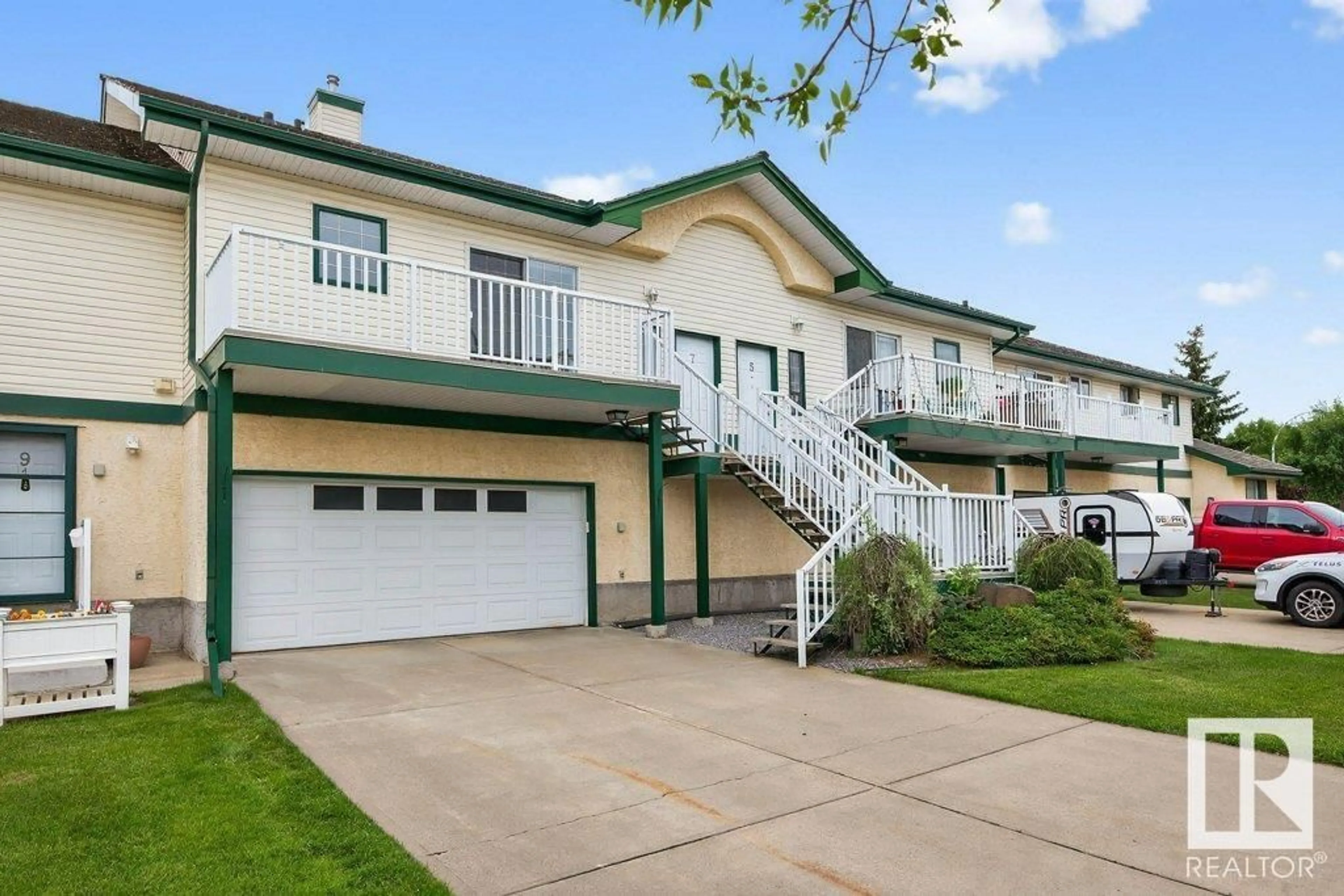 Home with vinyl exterior material, street for 11 - 7 HUNCHAK WY, St. Albert Alberta T8N6P2