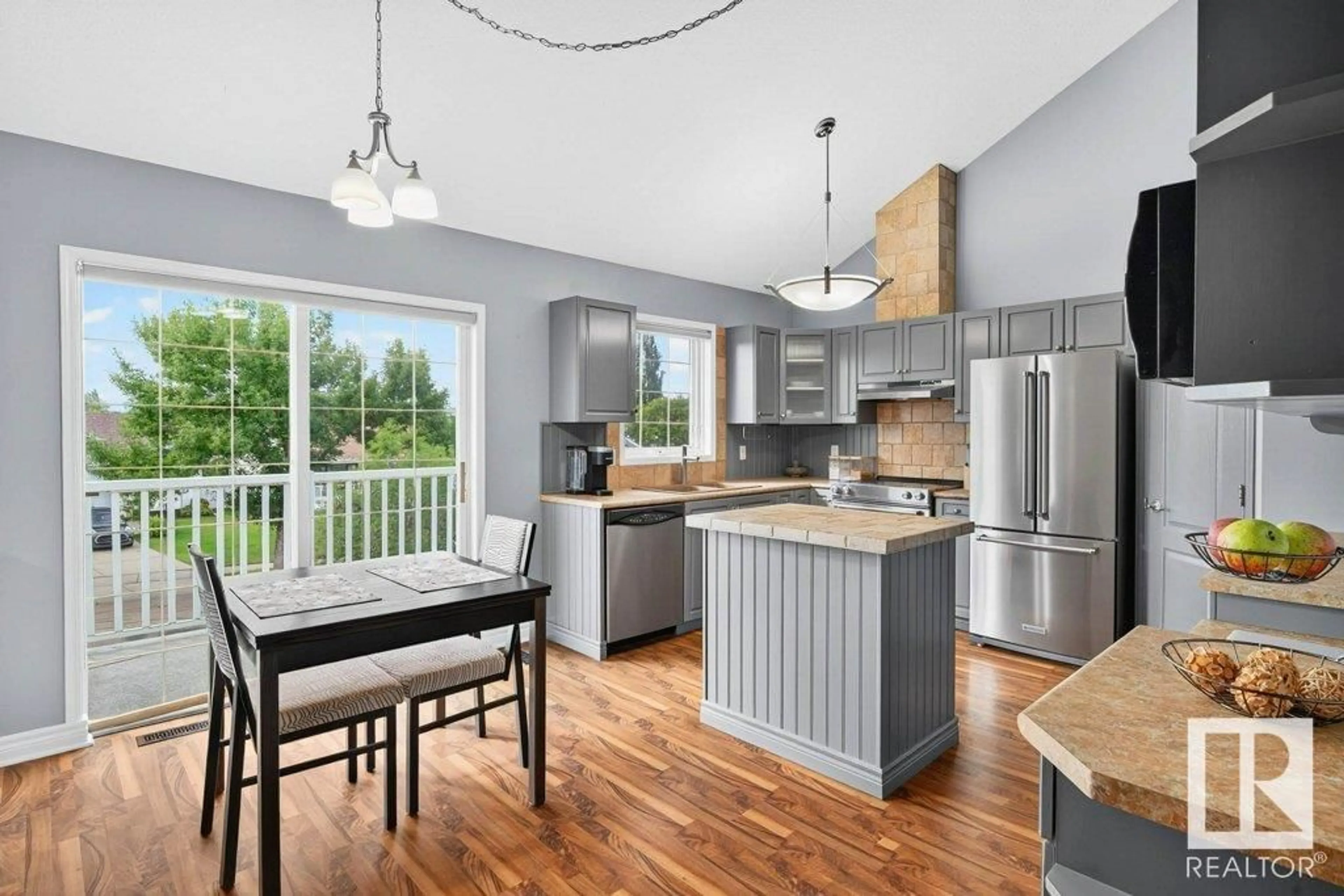 Open concept kitchen, wood/laminate floor for 11 - 7 HUNCHAK WY, St. Albert Alberta T8N6P2